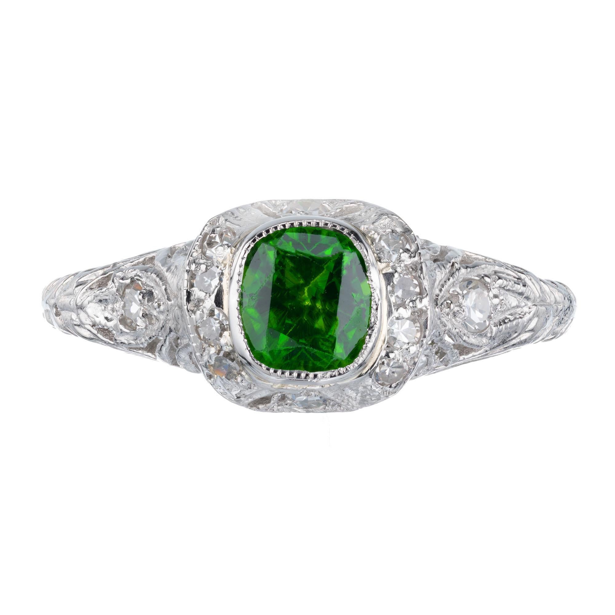 Edwardian 1910 demantoid green garnet and diamond engagement ring. GIA certified simple heat only, cushion cut center stone with round accent diamonds in a platinum filigree setting. 

1 bright green demantoid cushion Garnet, approx. total weight