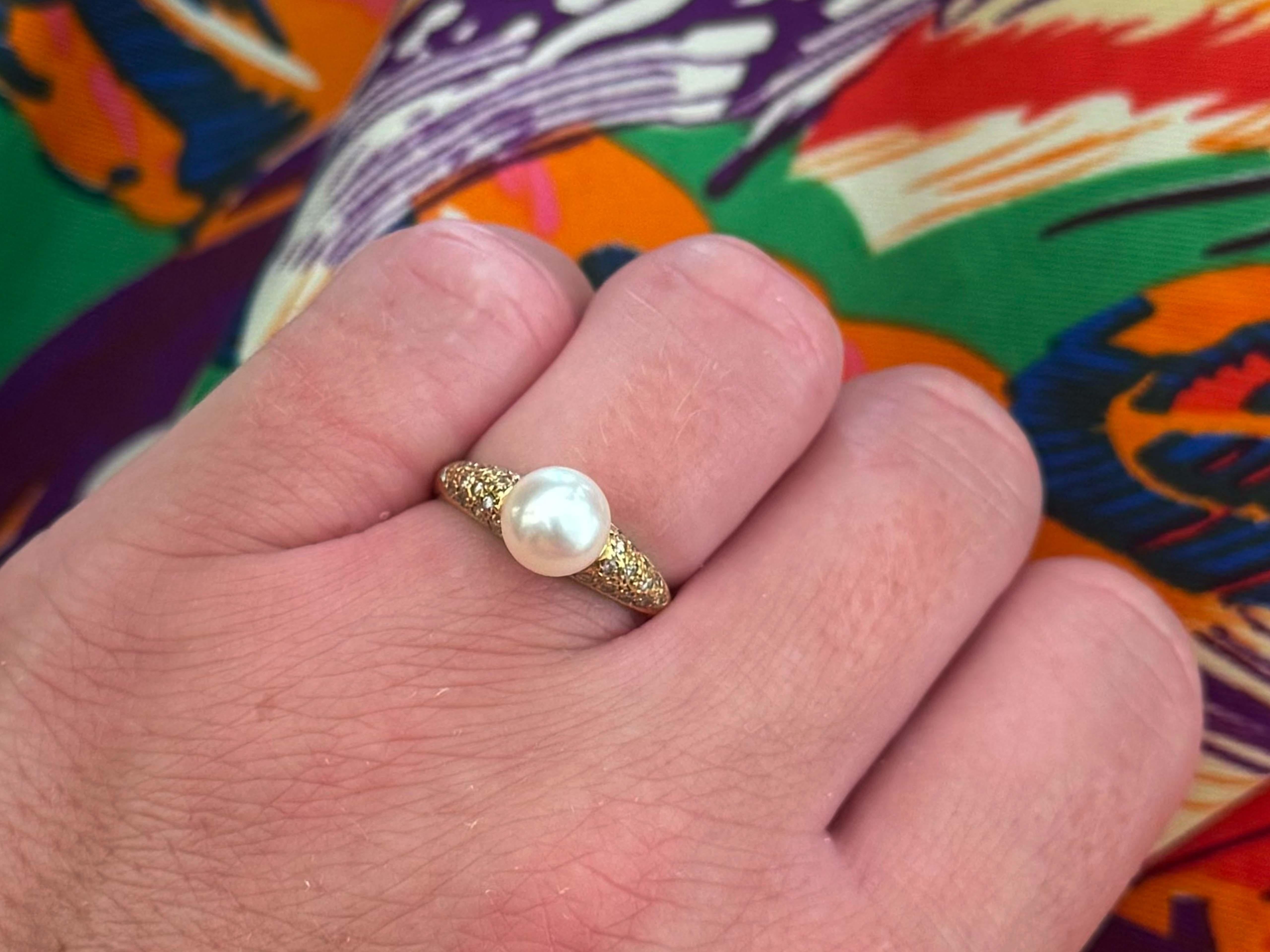 Ring Specifications:

Metal: 18k Yellow Gold

Total Weight: 3.4 Grams

Pearl Diameter: 7.4 mm

Pearl Count: 1 white akoya pearl

Diamond Count: 26 round brilliant cut

Diamond Color: H-J

Diamond Clarity: SI1

Diamond Carat Weight: 0.18 carats

Ring