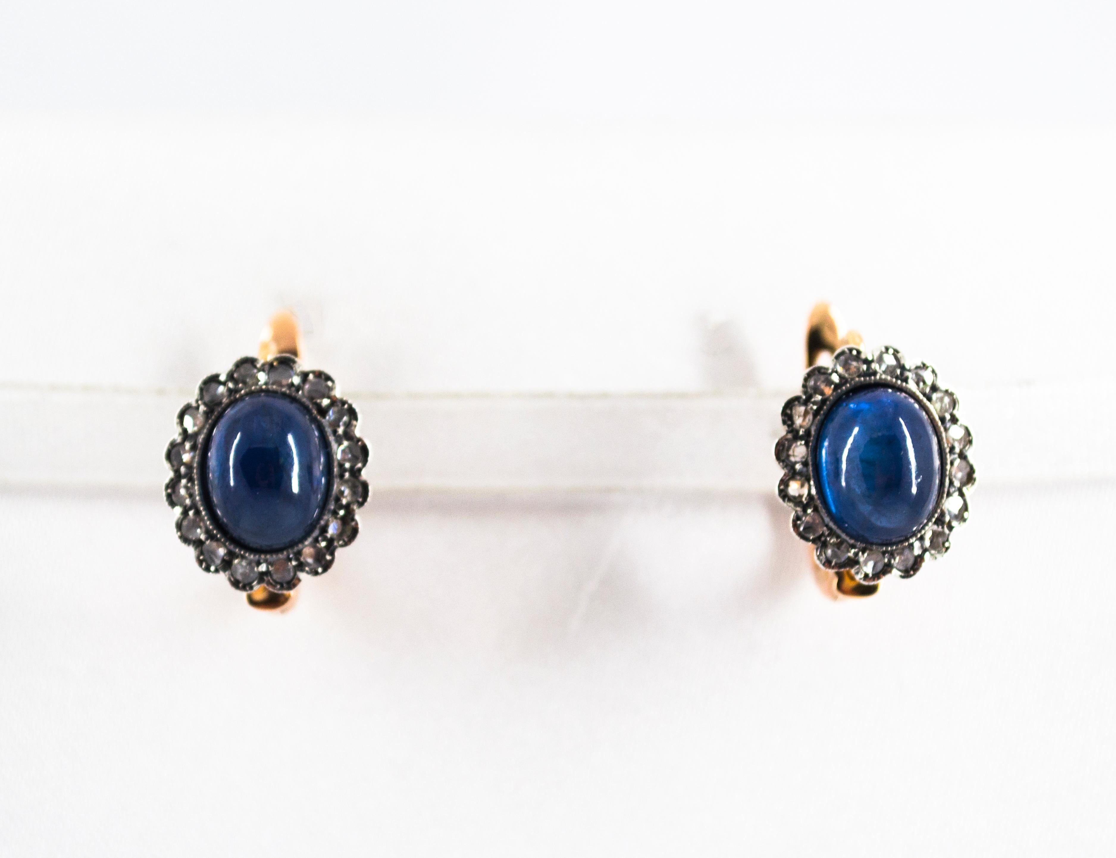 These Earrings are made of 9K Yellow Gold and Sterling Silver.
These Earrings are available also in 14K and 18K Yellow Gold.
These Earrings have 0.30 Carats of White Rose Cut Diamonds.
These Earrings have 7.10 Carats of Blue Sapphires.
All our