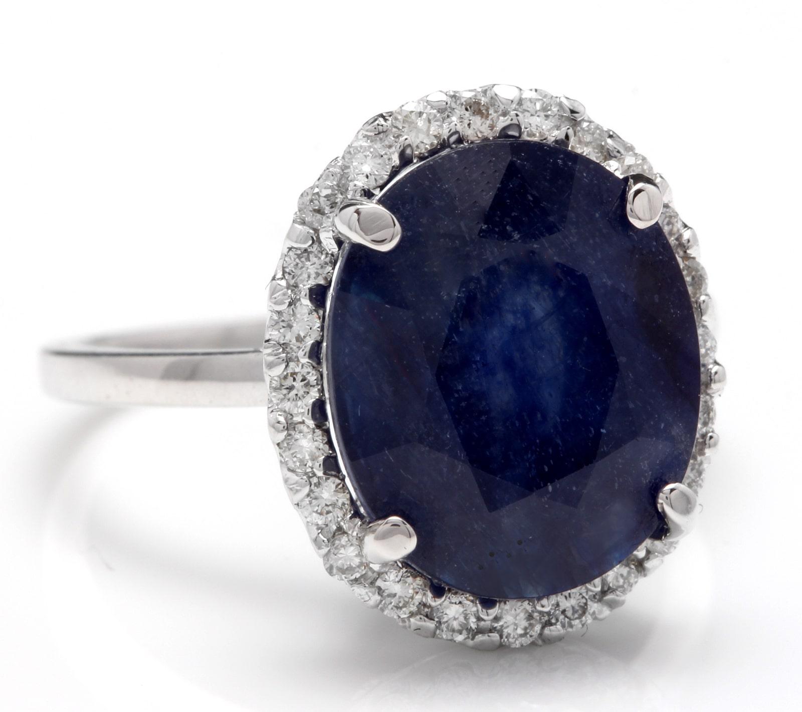 7.40 Carats Exquisite Natural Blue Sapphire and Diamond 14K Solid White Gold Ring

Total Blue Sapphire Weight is: Approx. 7.00 Carats

Sapphire Measures: Approx. 12.00 x 10.00mm

Sapphire Treatment: Diffusion

Natural Round Diamonds Weight: Approx.