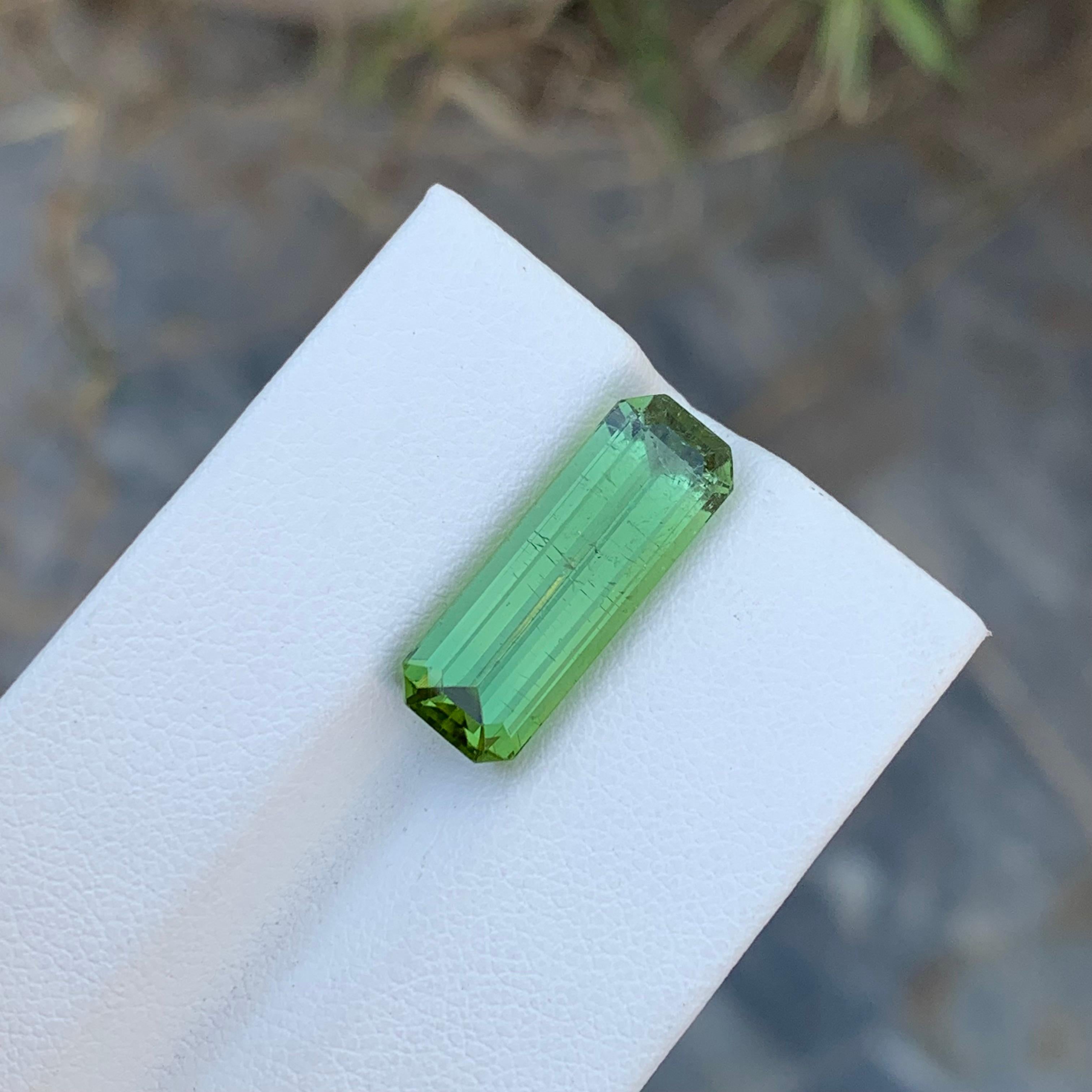 Loose Mint Tourmaline 
Weight: 7.40 Carats 
Dimension: 19.2 x 6.9 x 6 Mm
Colour: Mint Green 
Shape : Long Emerald 
Certificate: On Demand 
Origin: Afghanistan 
Treatment: Non 

Mint tourmaline, a captivating variety within the tourmaline family,