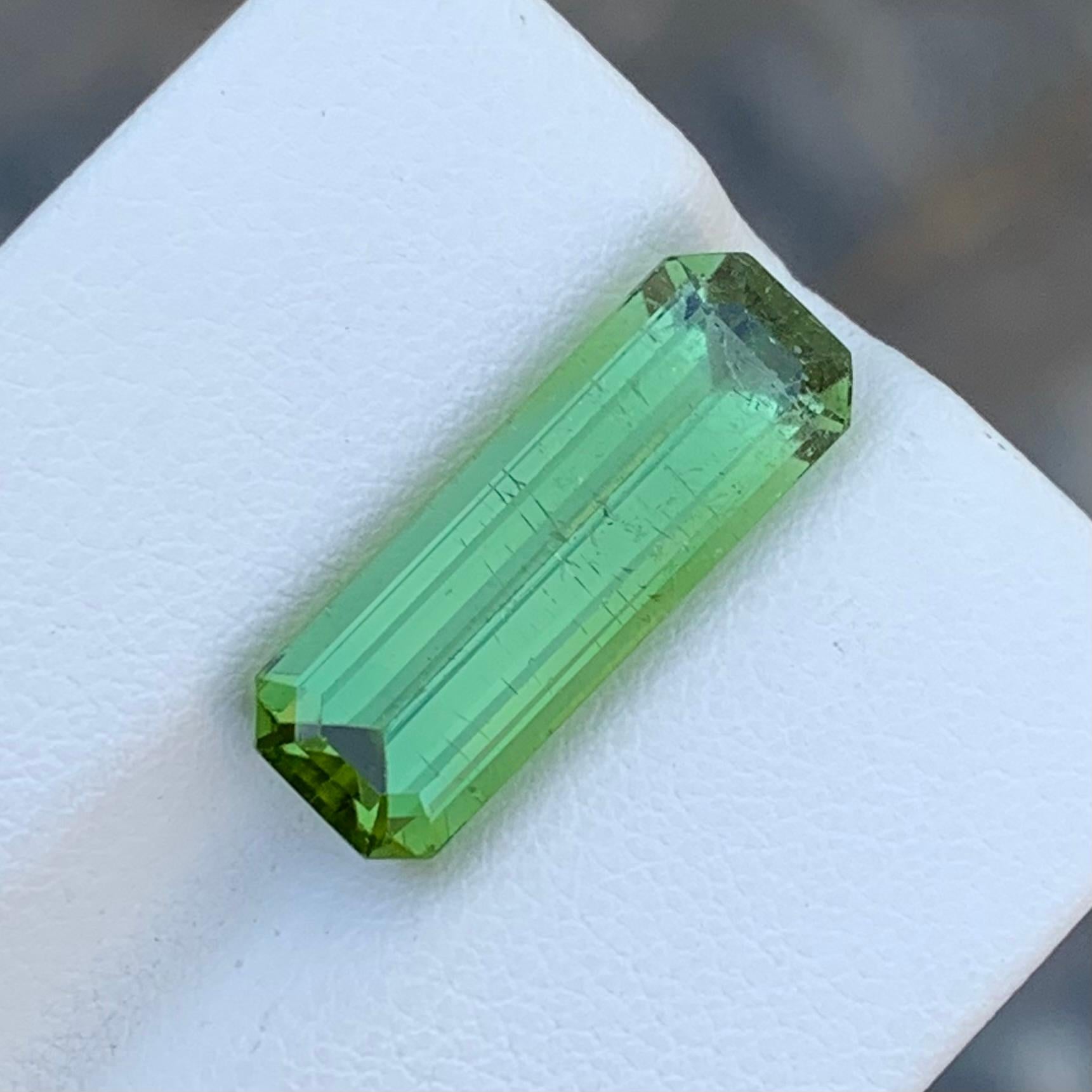 Arts and Crafts 7.40 Carat Natural Loose Long Slightly Included Emerald Shape Mint Tourmaline  For Sale
