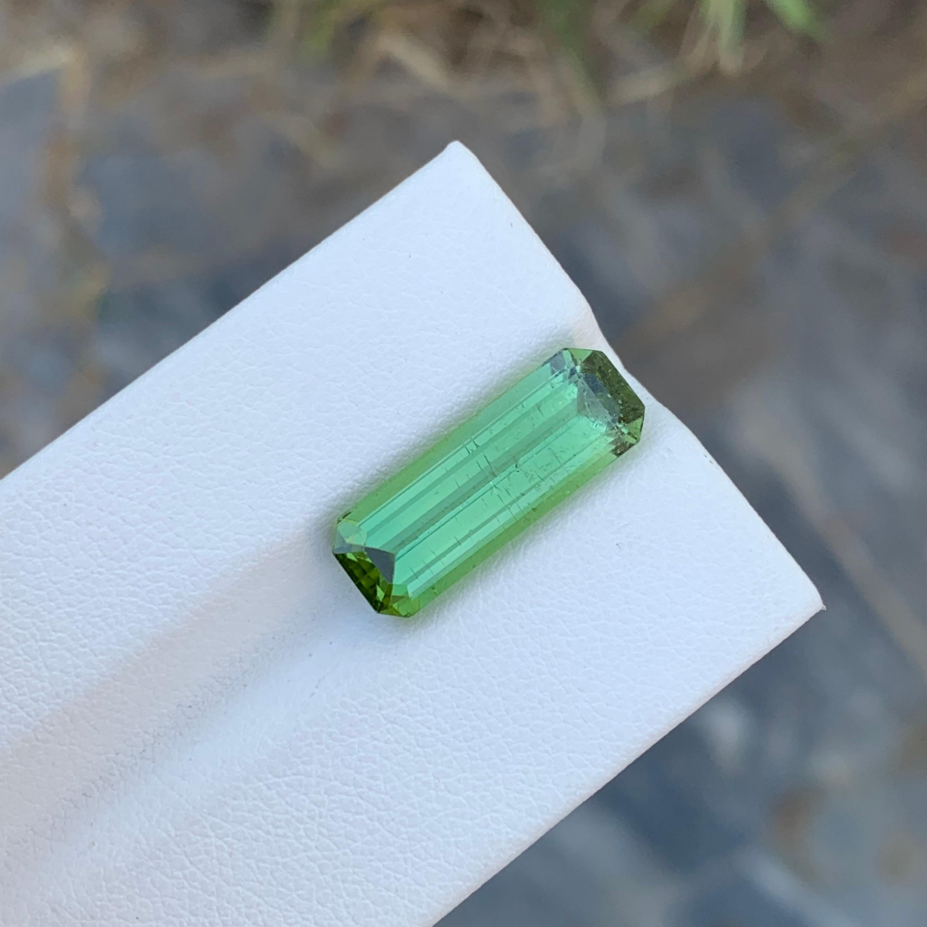 Women's or Men's 7.40 Carat Natural Loose Long Slightly Included Emerald Shape Mint Tourmaline  For Sale