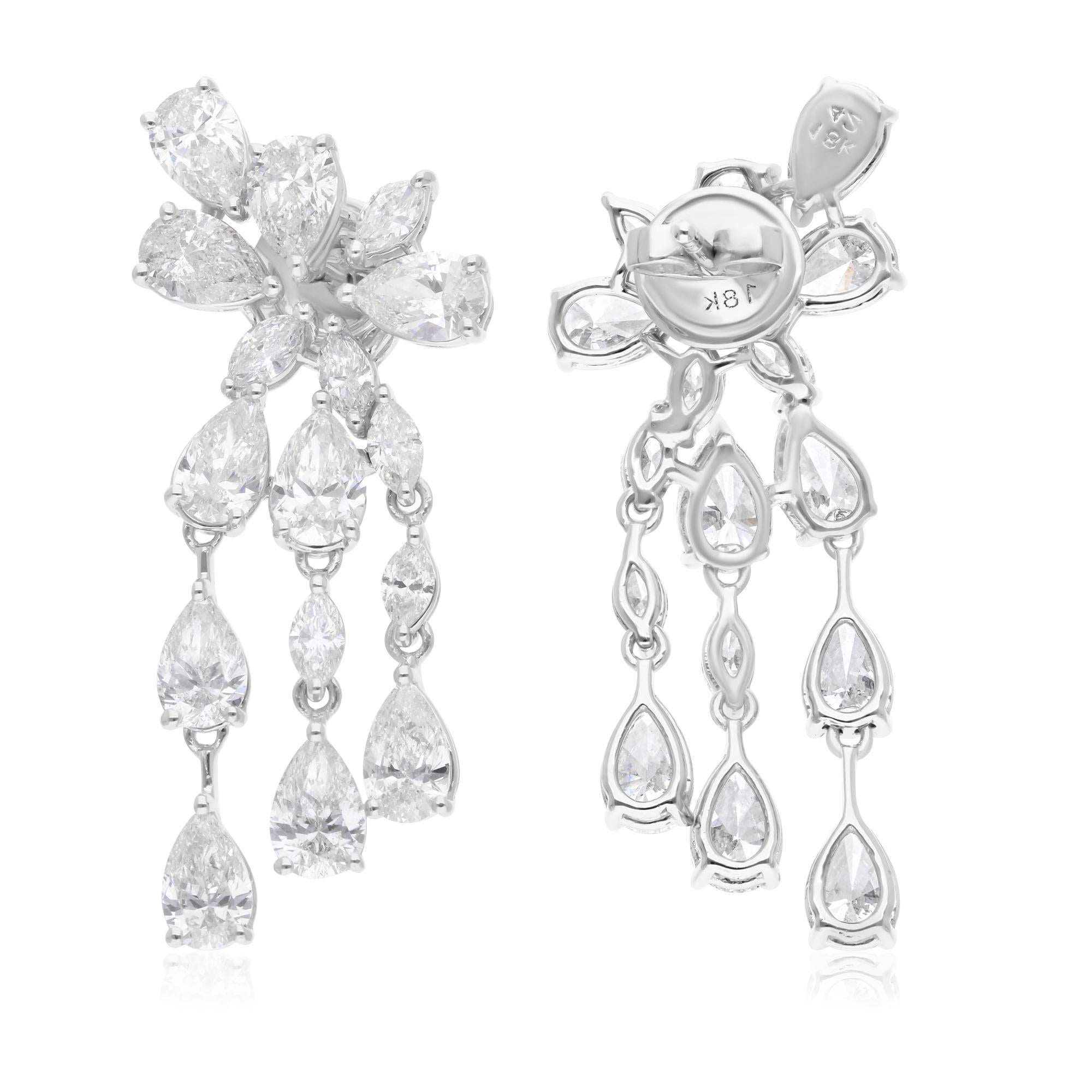 Elevate your elegance with these breathtaking 7.40 Carat Multi Shape Diamond Earrings, an exquisite blend of brilliance and craftsmanship. These stunning earrings are crafted from luxurious 18 Karat White Gold, providing a sleek and modern backdrop