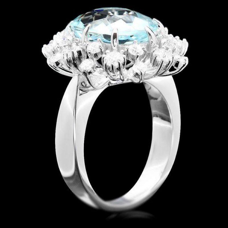 7.40 Carats Natural Aquamarine and Diamond 14K Solid White Gold Ring

Total Natural Aquamarine Weights: Approx. 6.40 Carats 

Aquamarine Measures: Approx. 13 x 10 mm

Natural Round Diamonds Weight: Approx. 1.00 Carats (color G-H  / Clarity