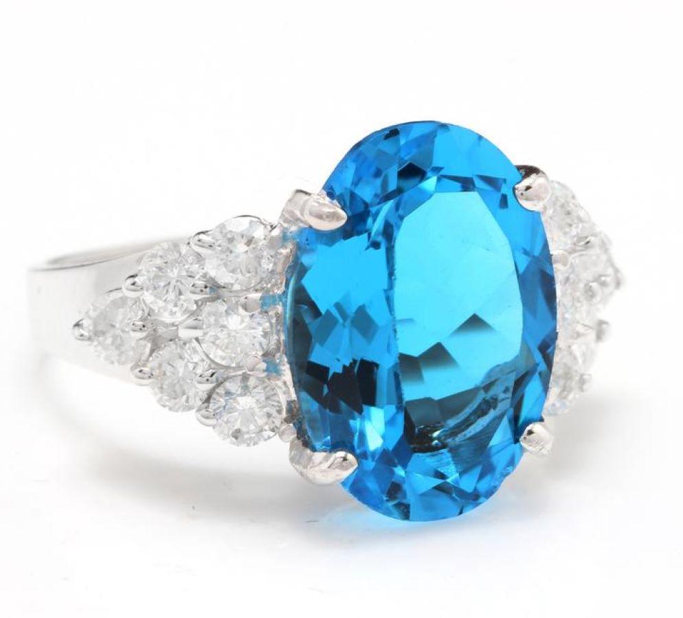 7.40 Carats Impressive Natural Swiss Blue Topaz and Diamond 14K Solid White Gold Ring

Suggested Replacement Value: Approx. $5,700.00

Total Topaz Weight is: Approx. 6.50 Carats

Topaz Treatment: Heating

Topaz Measures: Approx. 14.00 x