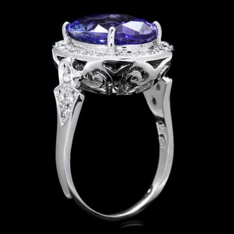 7.40 Carats Natural Tanzanite and Diamond 14K Solid White Gold Ring

Total Natural Oval Tanzanite Weight is: Approx. 6.80 Carats 

Tanzanite Measures: Approx. 14.00 x 10.00mm

Natural Round Diamonds Weight: Approx. 0.60 Carats (color G-H / Clarity