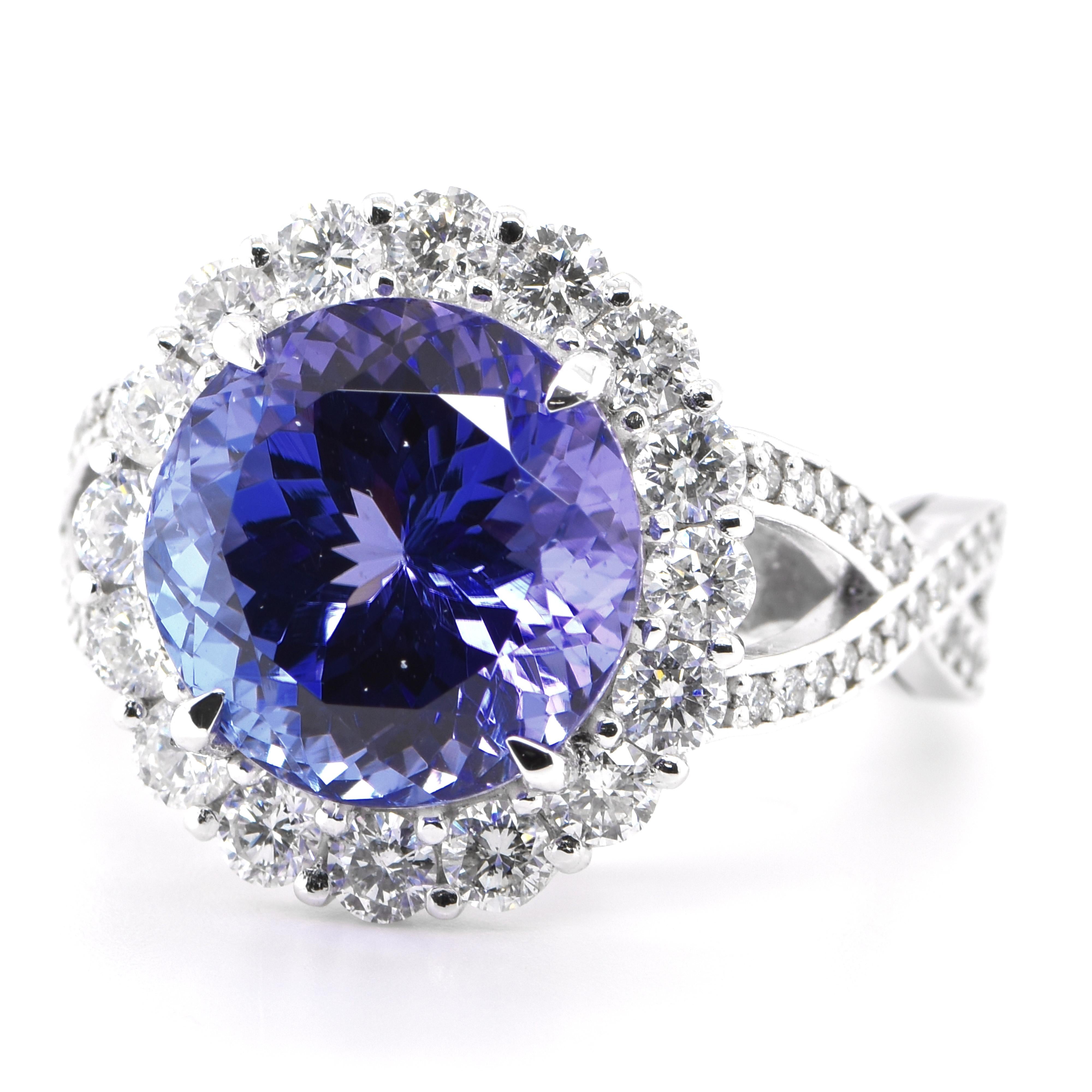 A beautiful Cocktail Ring featuring a 7.41 Carat Natural Tanzanite and 1.24 Carats of Diamond Accents set in Platinum. Tanzanite's name was given by Tiffany and Co after its only known source: Tanzania. Tanzanite displays beautiful pleochroic colors
