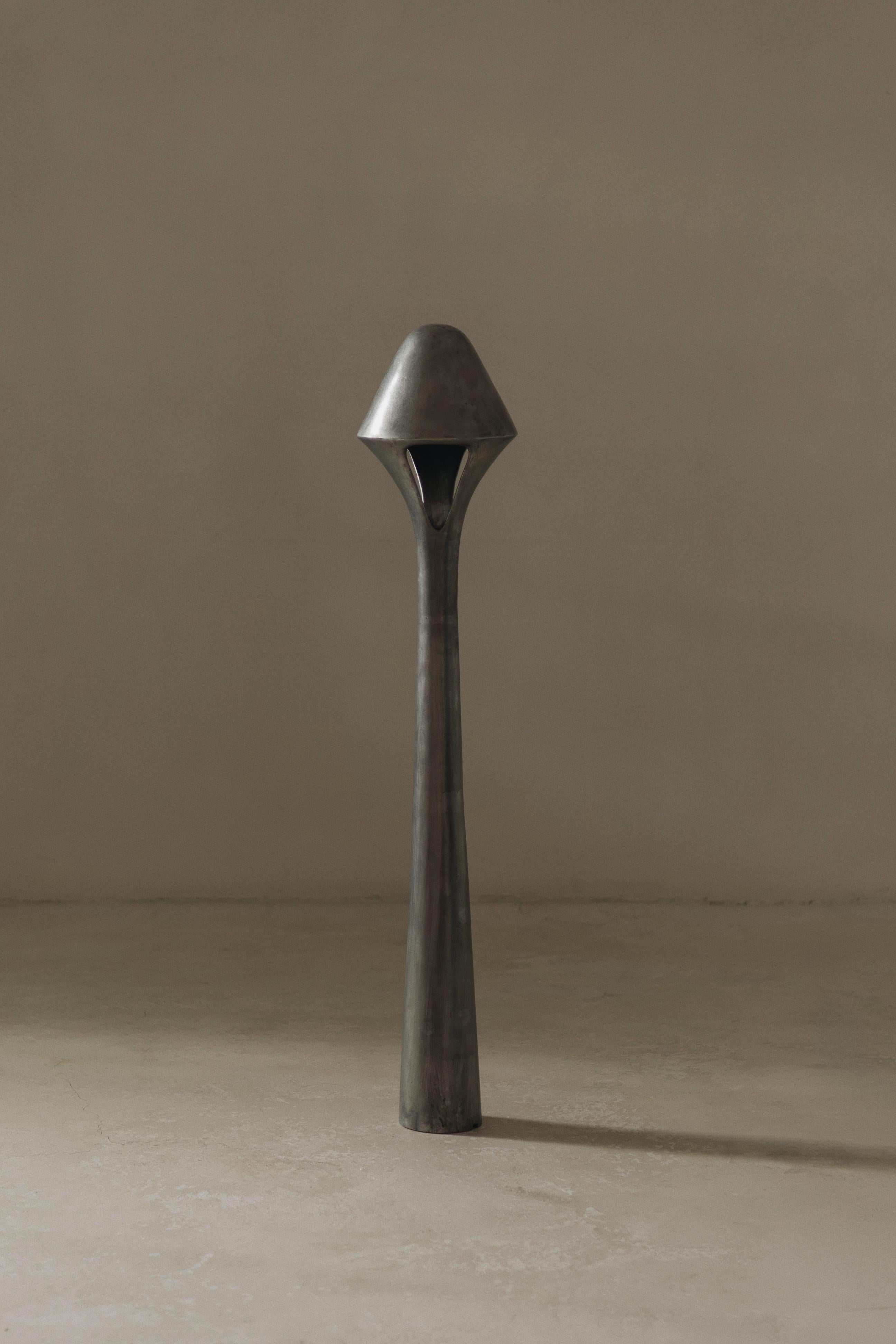 741HZ LAMP (PURITY / STABILITY)

This conical lamp interprets the 741 Hz frequency, associated with purity and stability. Its structure, supported by a harmonious tripod, symbolizes the connection between the body, mind, and spirit. The metallic