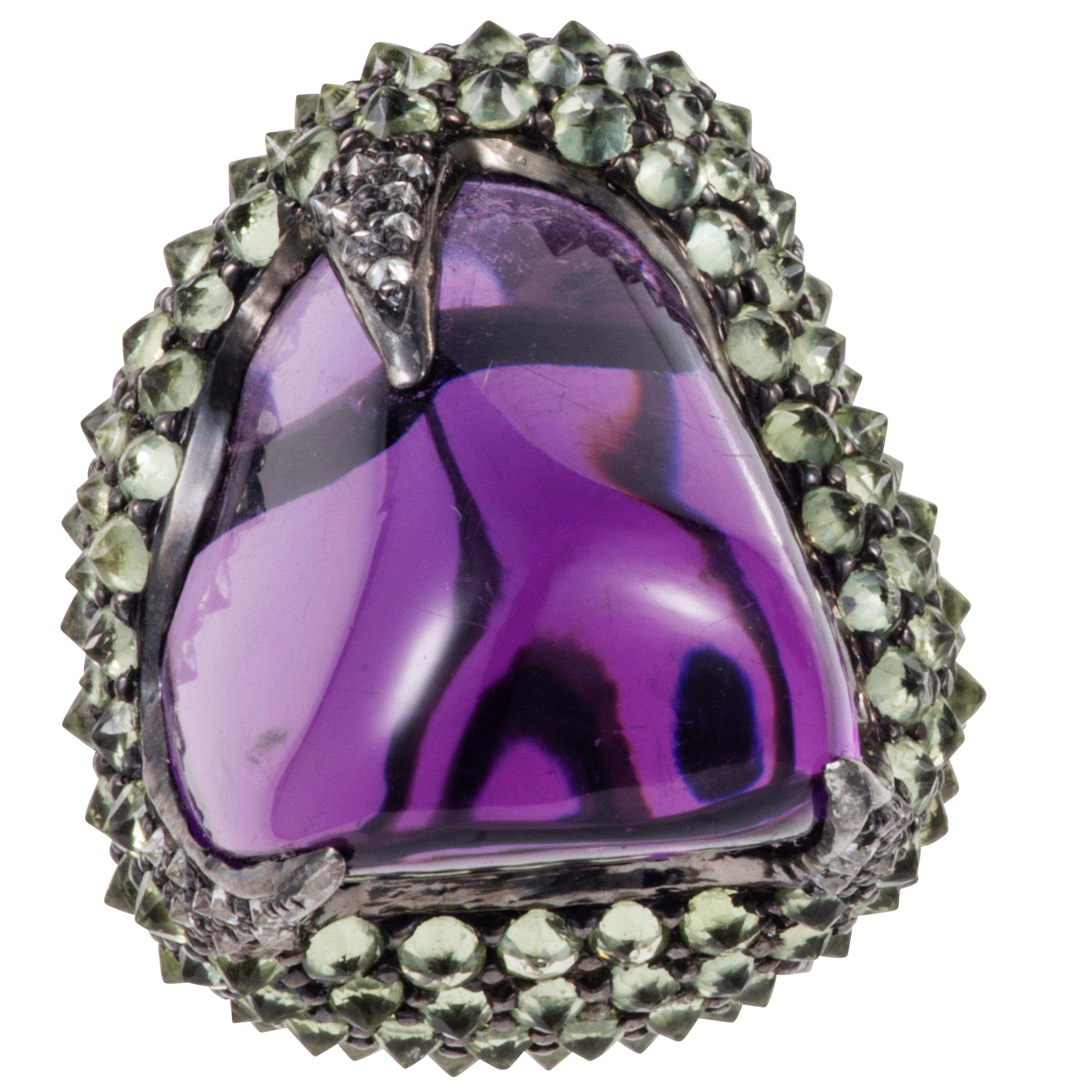 Gross weight: 31.120 grams 
Gold weight: 2.730 grams 
Amethyst: 74.140 carats
Peridots: 10.610 carats
Diamonds: 0.340 carats 
Silver: 11.400 grams 

Matching statement ring also available.  Glam rocks can be ordered in other precious stones.  All