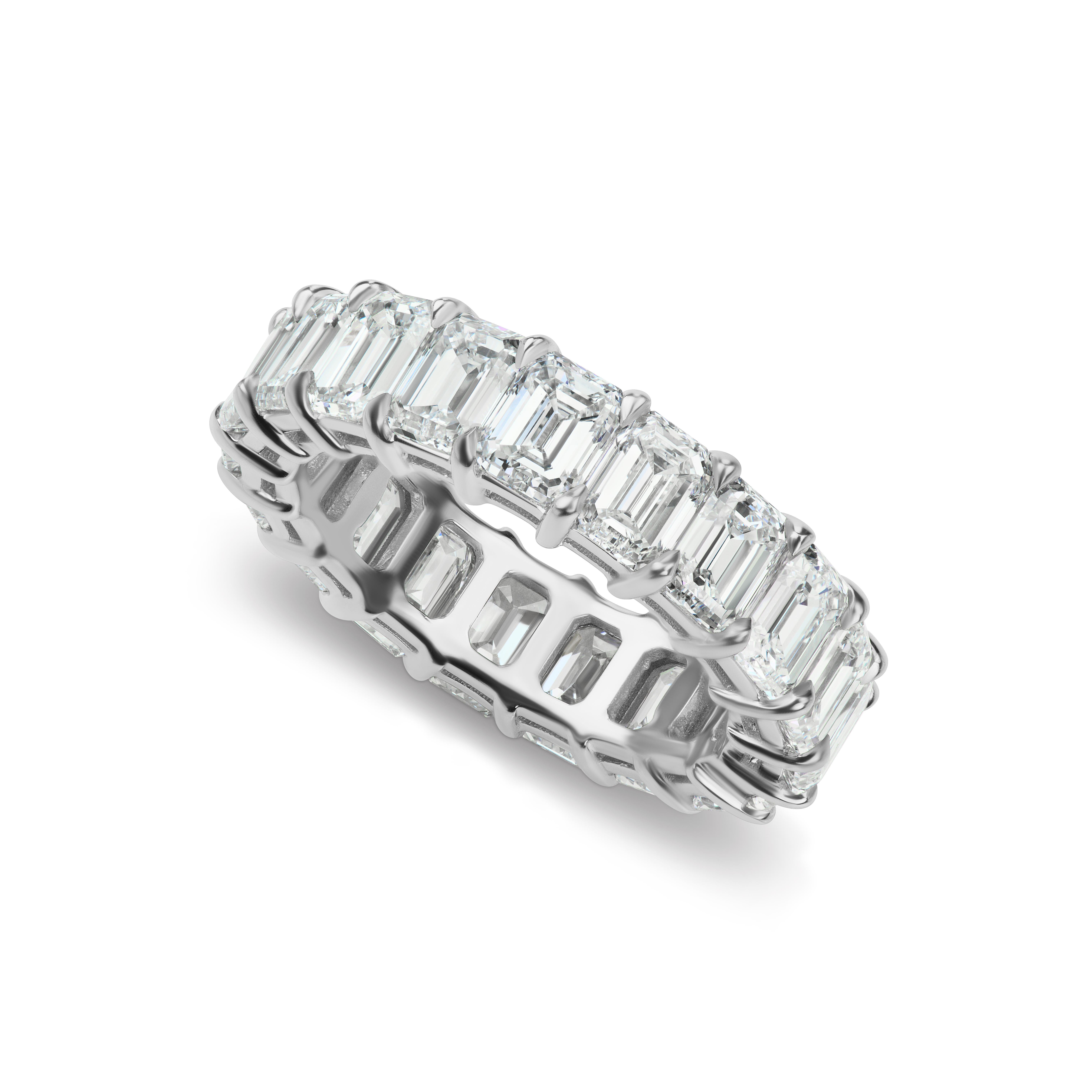 This stunning emerald cut diamond eternity band holds 19 stones G color VS quality weight 7.41ct. total weight. It is 14kt in a size 6.
Not your size? Not a problem! We can easily make another to fit your finger. If you don't see something, say