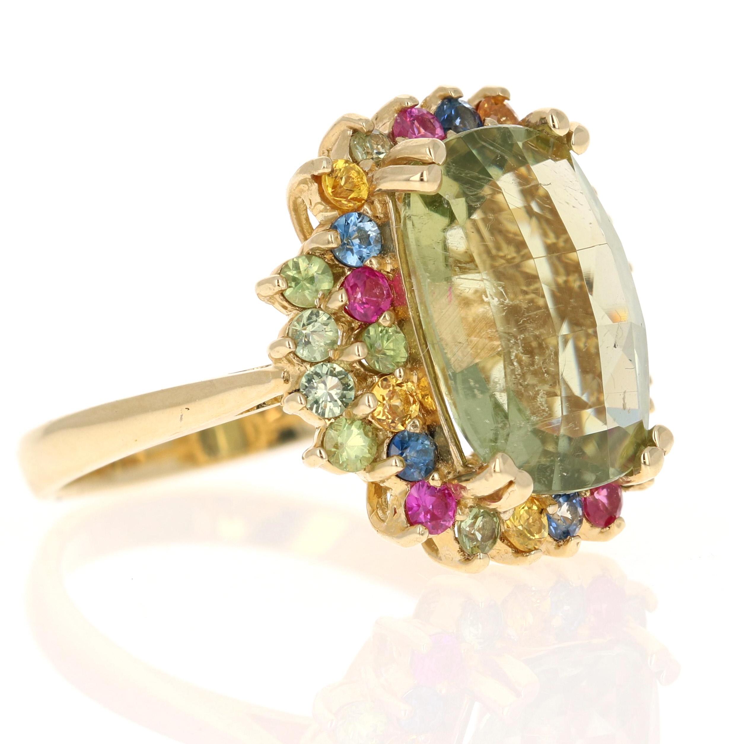 7.42 Carat Tourmaline Multicolor Sapphire Yellow Gold Cocktail Ring

This Ring has a Cushion Checkered Cut Green Tourmaline that weighs 6.09 Carats and 32 Multi Sapphires that weigh 1.33 Carats. 
The Total Carat Weight of the Ring is 7.42 Carats.