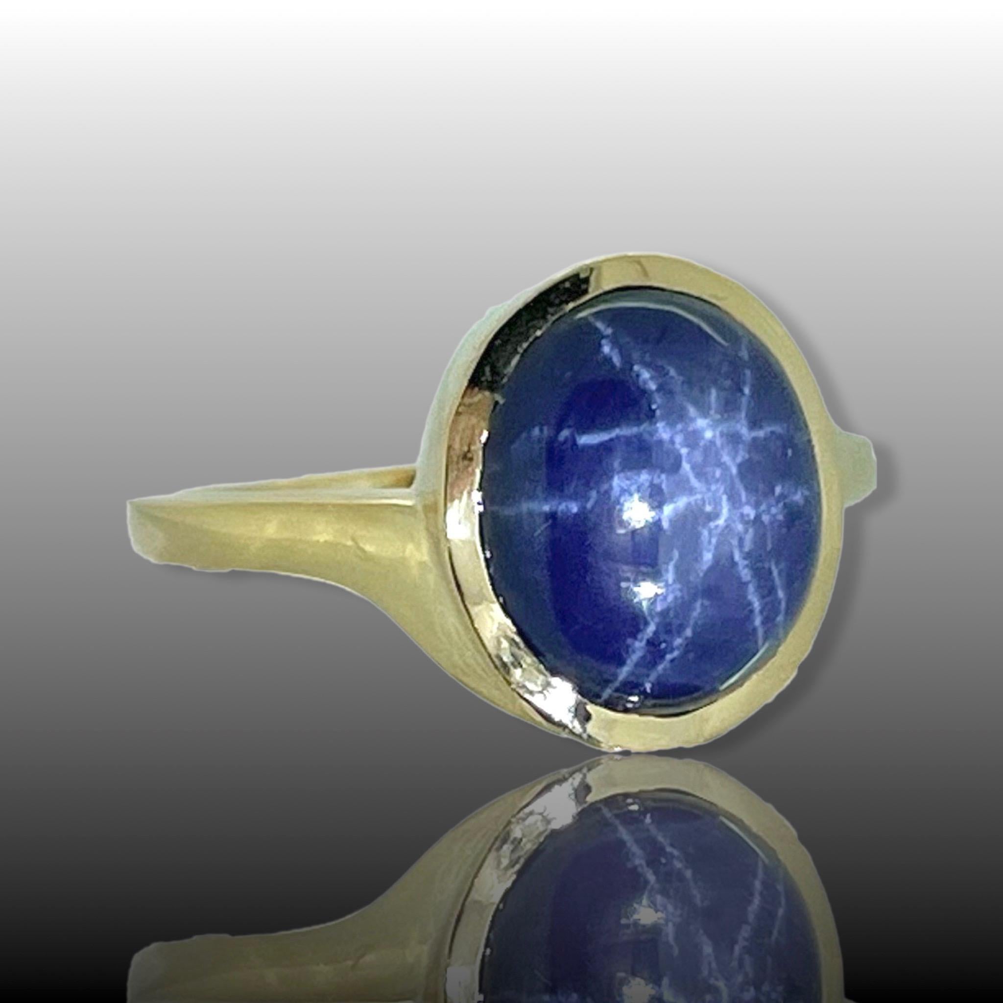 This beautiful ring is set with a vibrant blue Star sapphire of 7.42ct. We can see a star revealed under incandescent light. The ring is made in 18kt yellow gold and it is marked with the French owl. It is in excellent condition.
Weight: