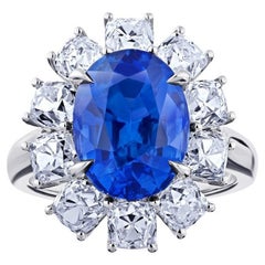 Anello in platino con zaffiro blu ovale e diamante da 7,43 carati