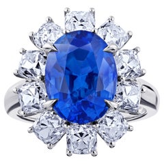 Anello in platino con zaffiro blu ovale e diamante da 7,43 carati