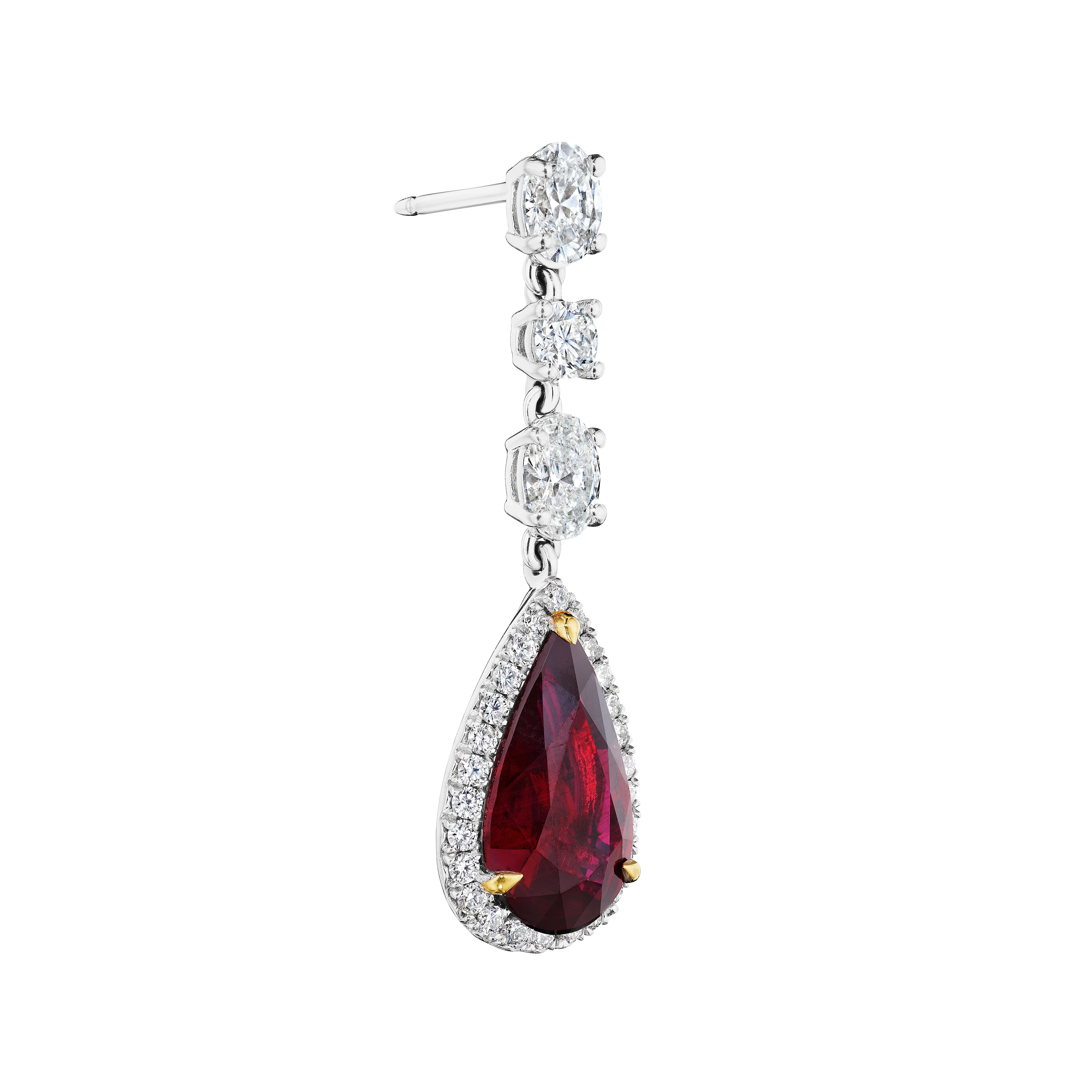 •	18KT Two Tone
•	7.44 Carats
•	Sold as a pair

•	Number of Pear Shape Rubies: 2
•	Carat Weight: 6.04ctw
•	Color: Vivid Red
•	Origin: Mozambique
•	Certificate: GRS 2017-092046 & GRS 2017-092047
•	No indications of Heating

•	Number of Oval Diamonds: