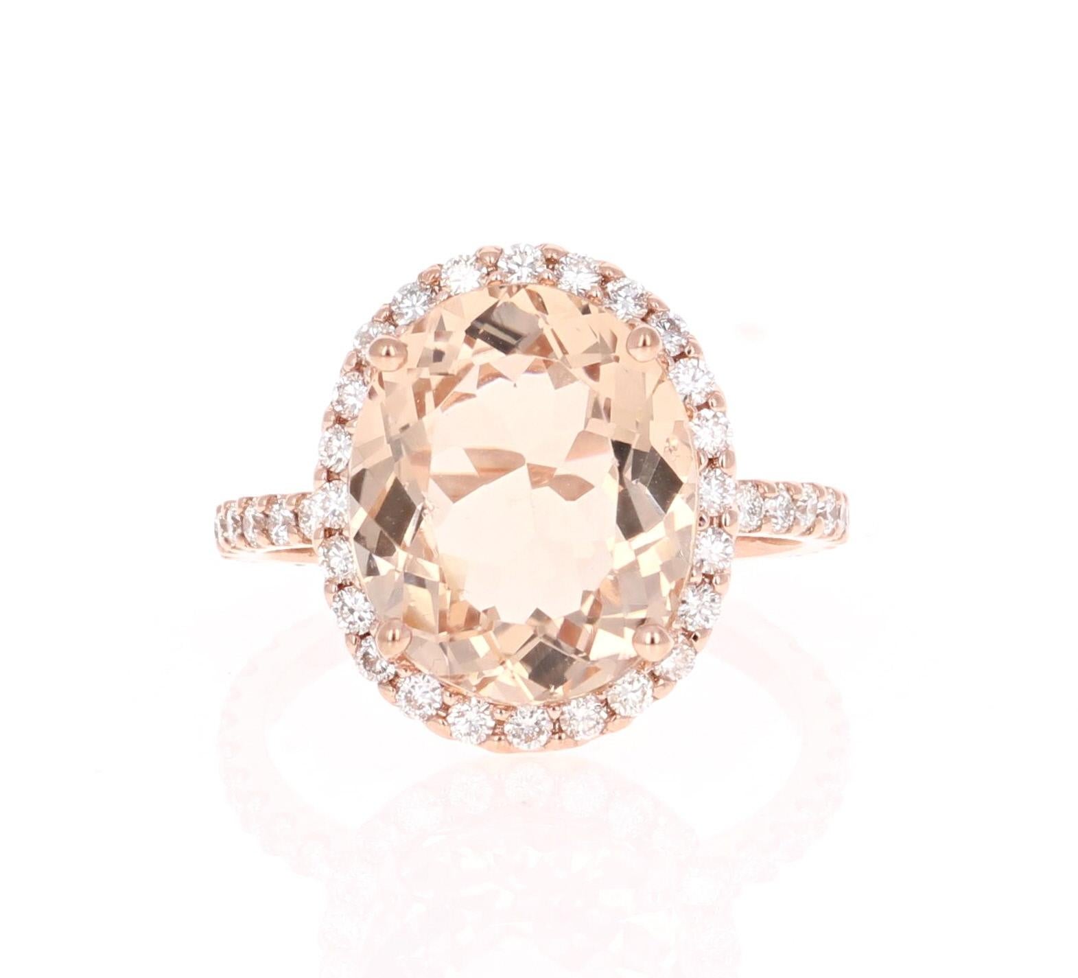 This gorgeous and classy Morganite Ring can easily substitute for a unique and edgy Engagement or Promise ring for that special someone.  

It has a 6.73 Carat Oval Cut Morganite as its center and is surrounded by a Halo of 48 Round Cut Diamonds
