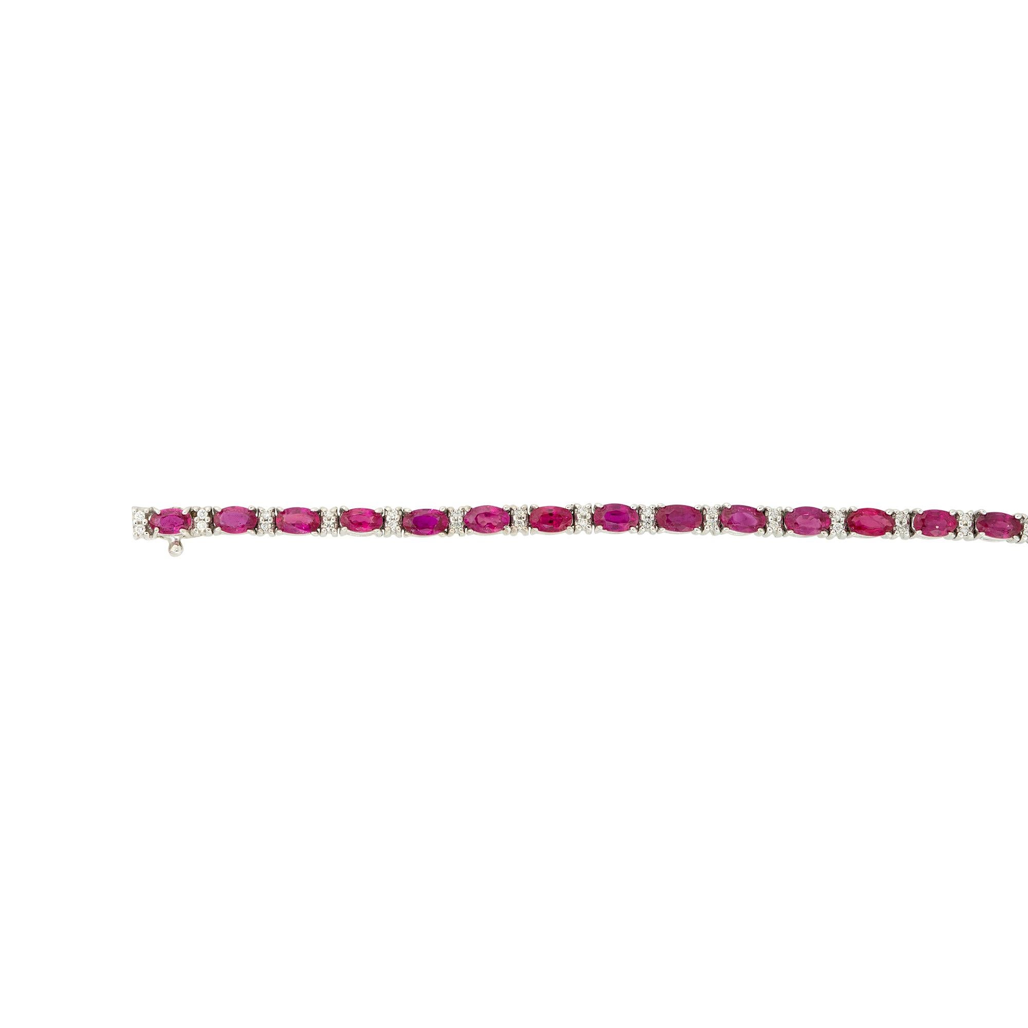 18k White Gold 7.45ctw Oval Ruby and Diamond Tennis Bracelet

Material: 18k White Gold
Gemstone Details: Approximately 7.45ctw of Oval Cut Rubies
Diamond Details: Approximately 0.60ctw of Round Brilliant Diamonds
Clasps: Tongue in Box Clasp with