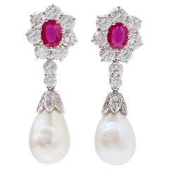 7.45 Carats Diamonds, Rubies, Pearls, Platinum and 18 Kt White Gold Earrings.