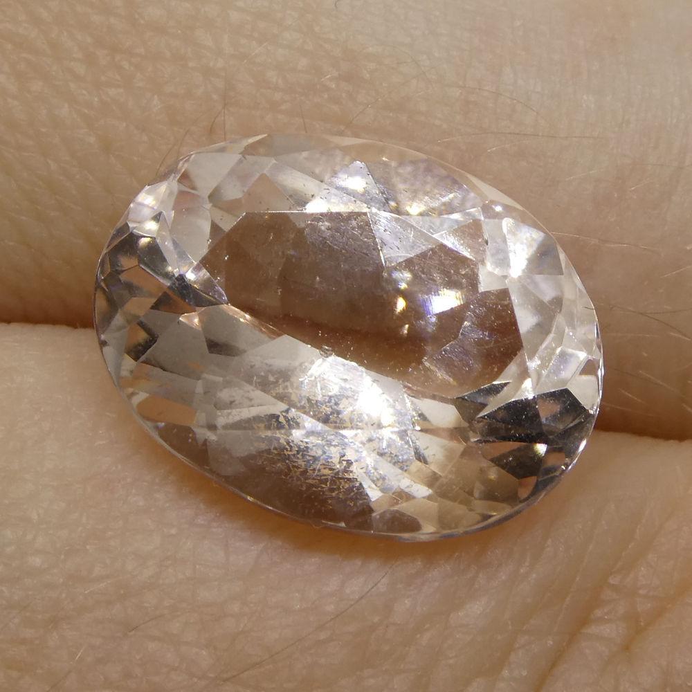 Description:

Gem Type: Morganite
Number of Stones: 1
Weight: 7.46 cts
Measurements: 14.72x11.31x7.68 mm
Shape: Oval
Cutting Style Crown: Modified Brilliant
Cutting Style Pavilion: Modified Brilliant
Transparency: Transparent
Clarity: Very Very