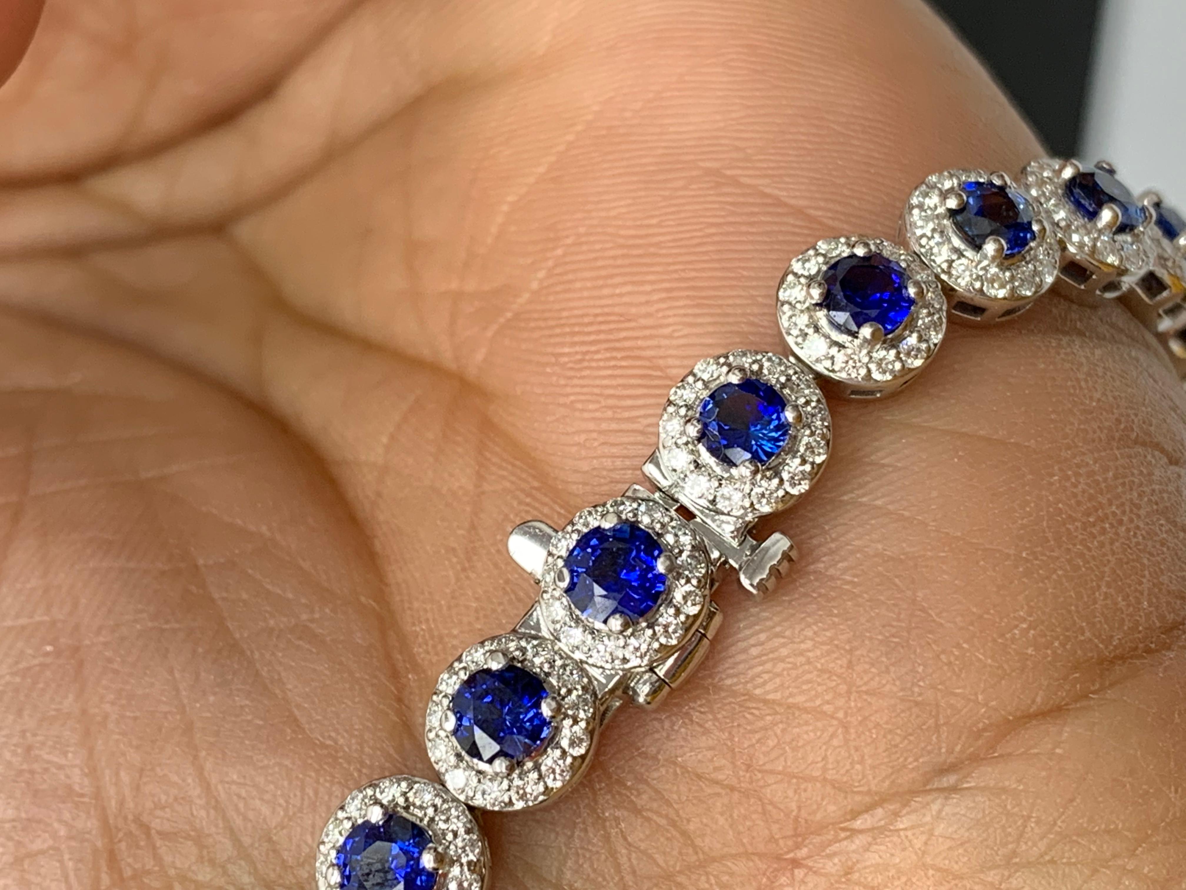 Round Cut 7.47 Carat Blue Sapphire and Diamond Halo Tennis Bracelet in 14k White Gold For Sale