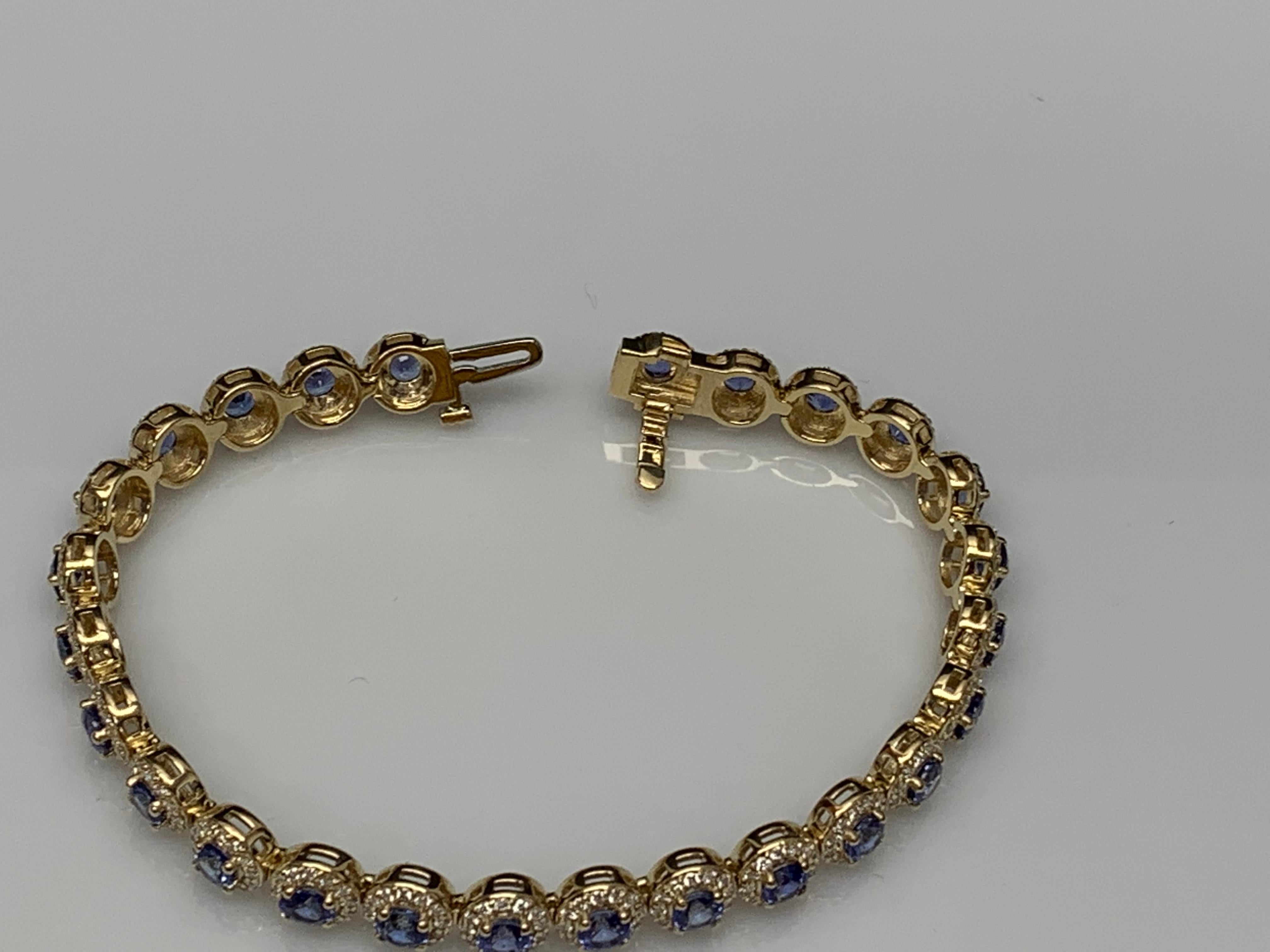 7.47 Carat Blue Sapphire and Diamond Halo Tennis Bracelet in 14k Yellow Gold For Sale 9