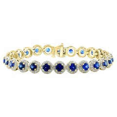 7.47 Carat Blue Sapphire and Diamond Halo Tennis Bracelet in 14k Yellow Gold