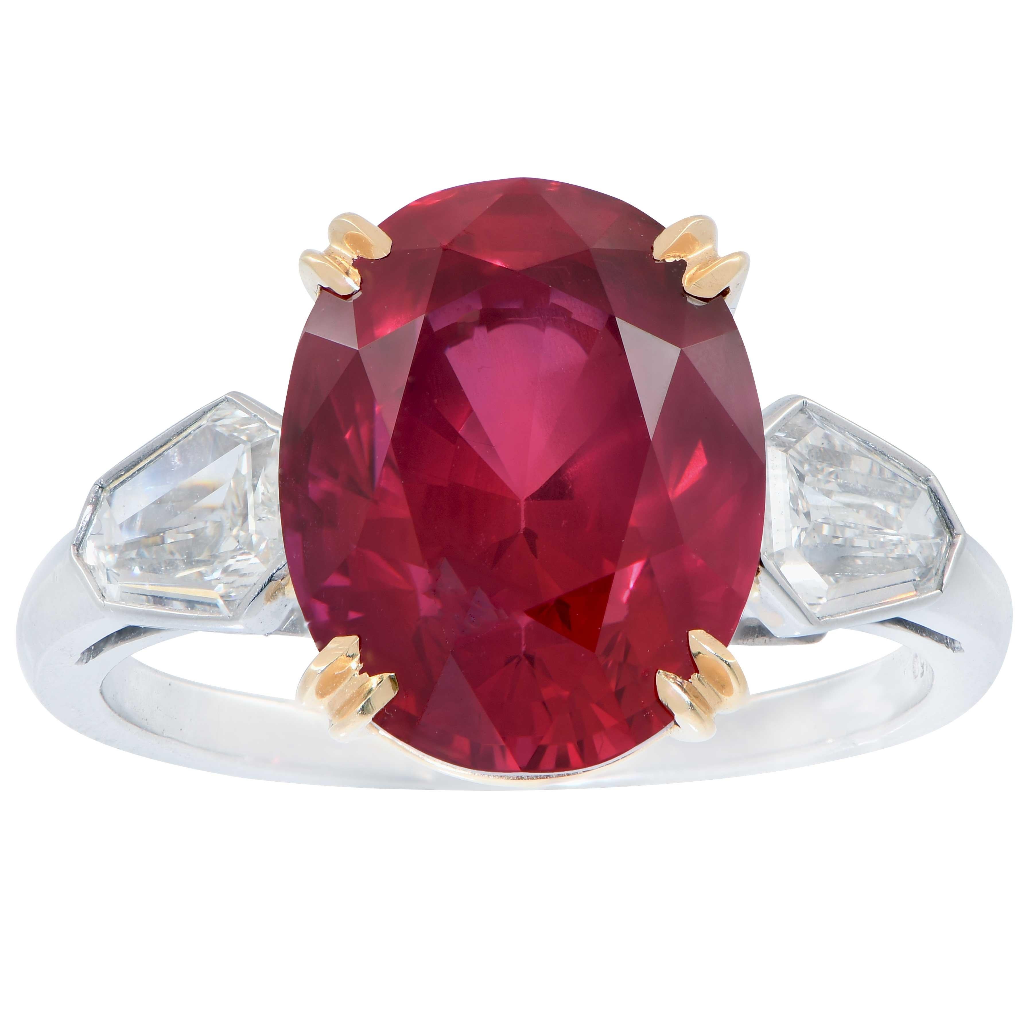 7.47 Carat GRS Graded No Heat Mozambique Oval Cut Ruby and Diamond Ring Features an exquisite pigeon's blood vivid red ruby with excellent crystal and proportions. This gorgeous ruby is set in a platinum mounting with two kite facet cut diamonds in