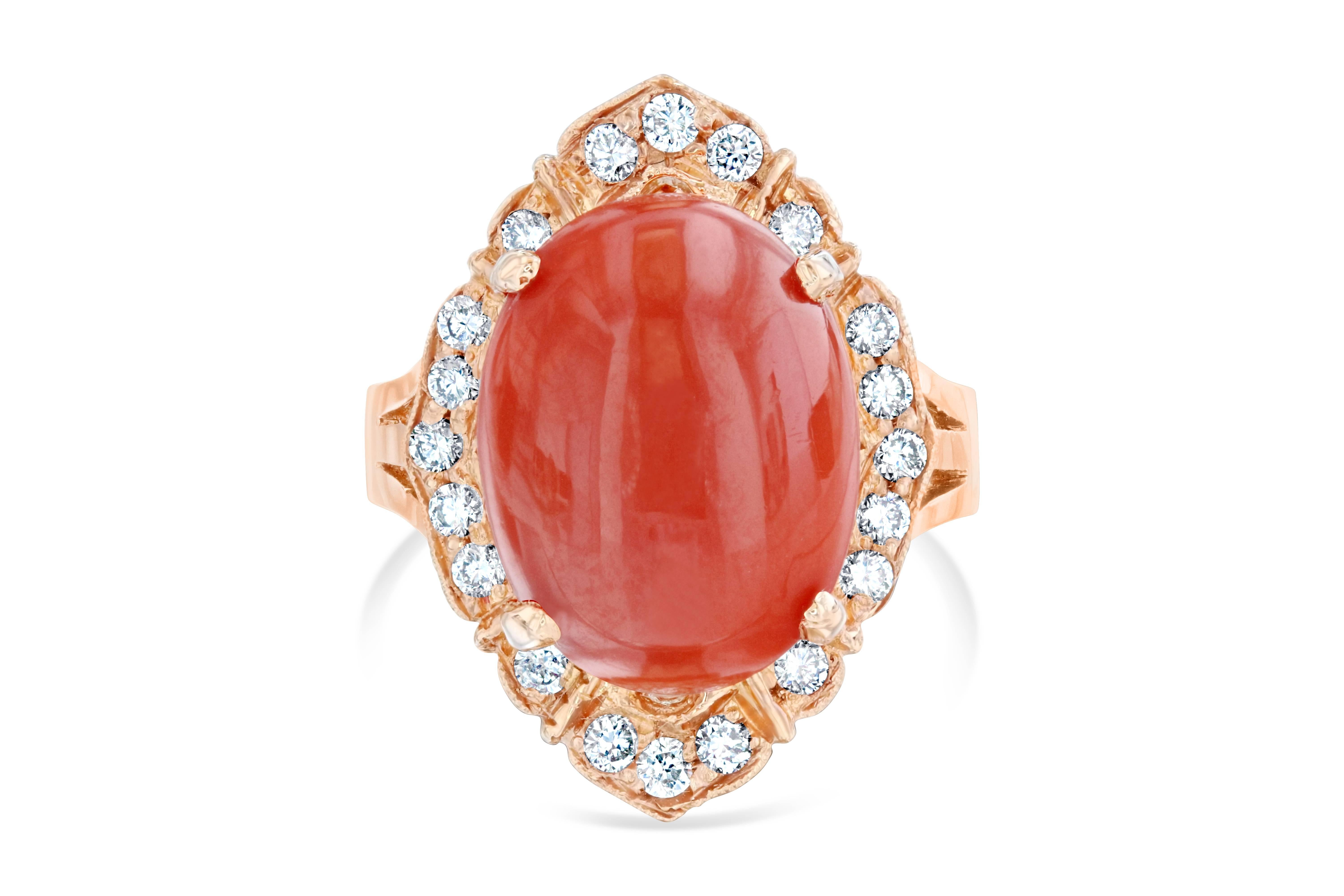 This beautiful ring can be worn however one pleases! It is delicately set and can be the most unique engagement or wedding ring or perhaps even an everyday ring...

The Coral is 7.02 Carats and is adorned by 20 Round Cut Diamonds weighing 0.46