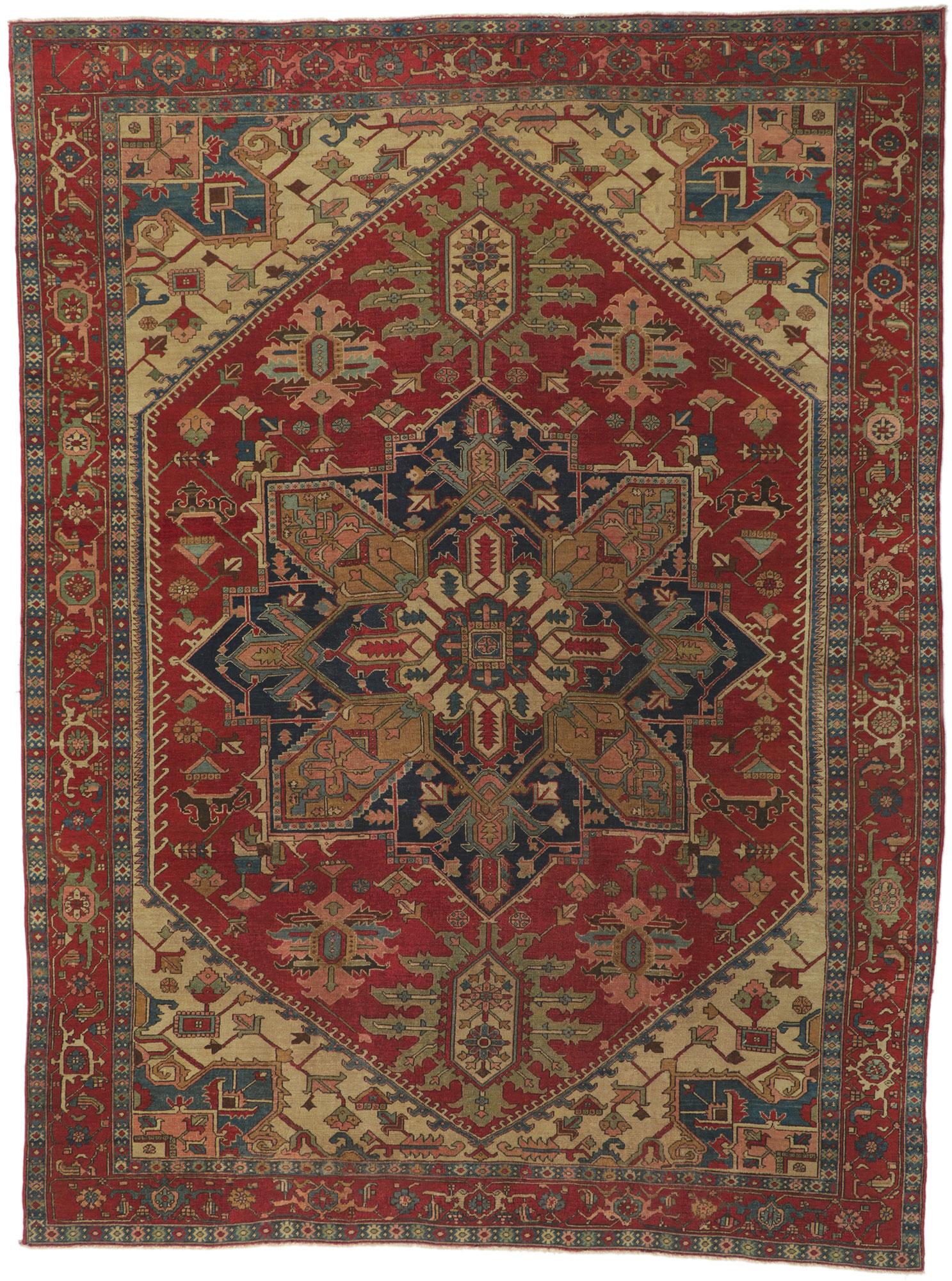 74972 Distressed antique Persian Heriz Serapi rug with Edwardian Manor House Style 09'05 X 12'04. This hand knotted wool distressed antique Persian Heriz Serapi Rug features a large octofoil medallion with oversized palmette pendants floating in the