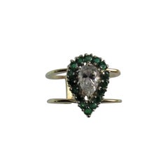 .74 Carat Pear Shape Diamond and Emerald Ring