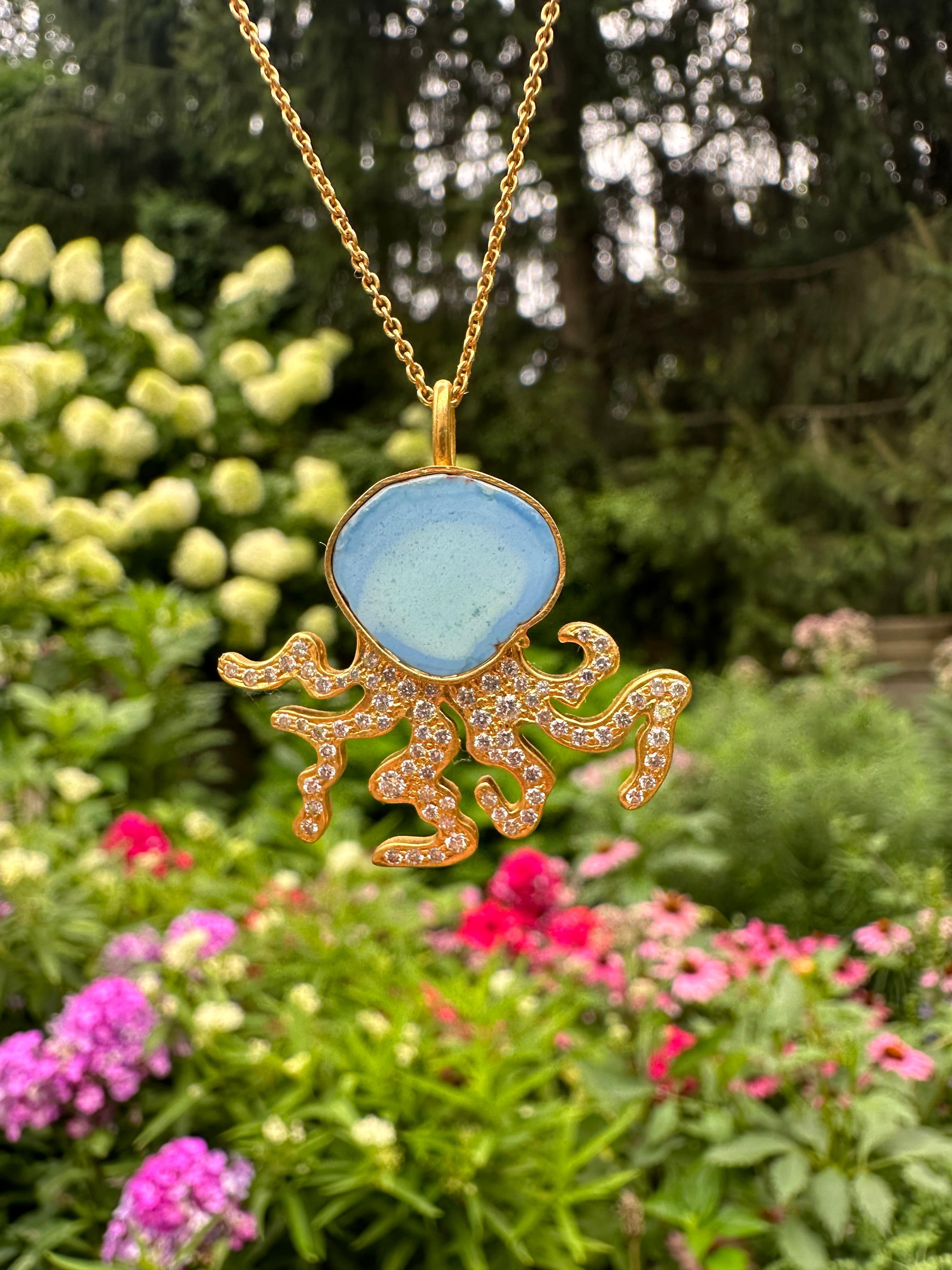 This .74cts Diamonds and Turquoise Octopus Necklace is set in 18kt matte gold and was designed by award winning jewelry designer, Lauren Harper.  The light blue turquoise gives the pendant a beautiful pop of color, surrounded by warm gold and
