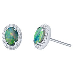 .74ctw Australian Oval Opal with .20ctw Diamond Halo Stud Earrings
