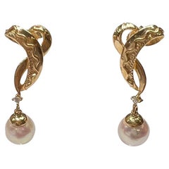 2pcs of Akoya Pearls with 14k Yellow Gold Push Back Clasp with Diamond