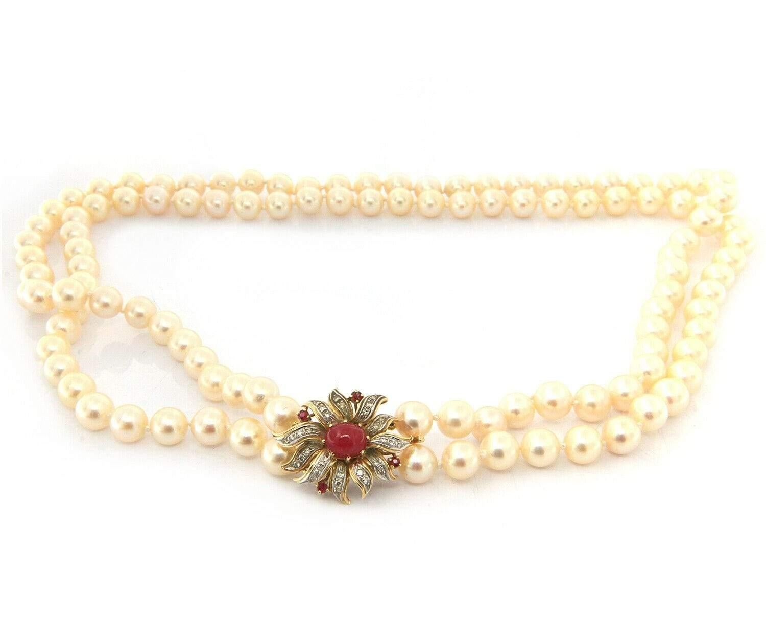 7.5 – 8.0 MM Cultured Pearl Double Strand Diamond and Ruby Clasp Necklace in 14K

Cultured Pearl Double Strand Diamond and Ruby Clasp Necklace
14K Yellow Gold
Pearl Size: Approx. 7.5 – 8.0 MM
Clasp Dimensions: Approx. 22.5 X 27.5 MM
Necklace Length: