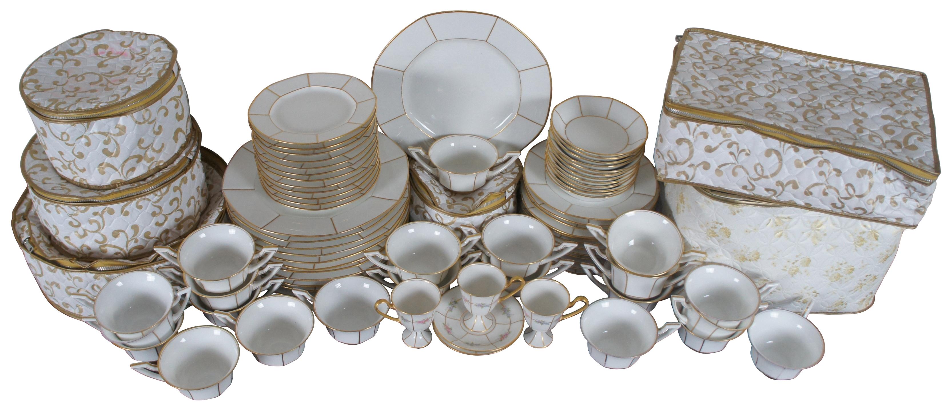 Antique 19th century 75 piece J Pouyat Limoges France porcelain dinnerware set, pattern POY254, with gilded accents and flowers on the demitasse cups.

Measures: 12 dinner plates - 9.875” x 1” / 12 salad plates - 7.375” x 0.75” / 12 bread plates -