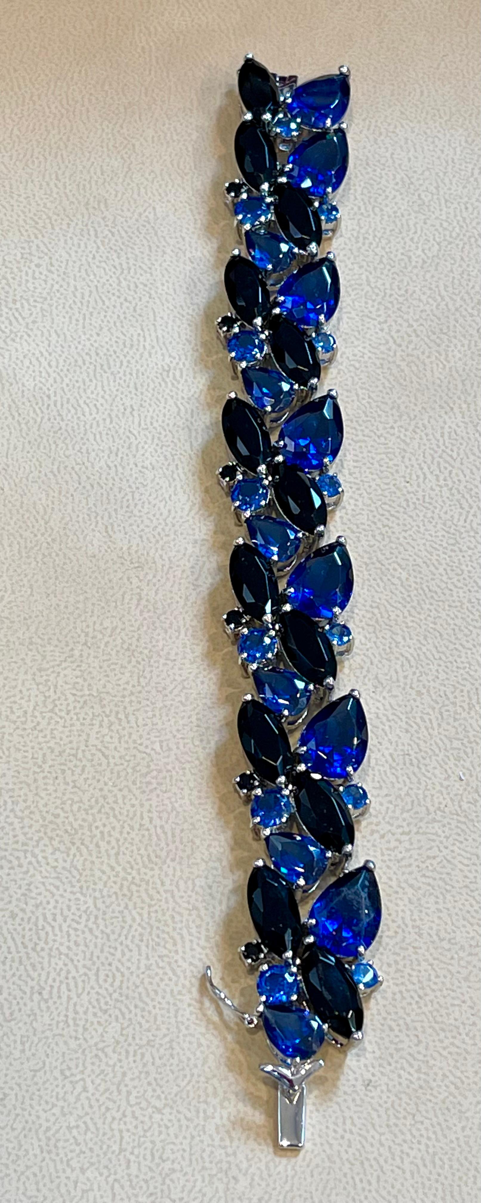  Cubic Zirconia or CZ is the cubic Crystalline form Of Zirconium dioxide. Its Hard and Usually  colorless.
This Bracelet is  amazing . Just looks like real blue sapphires
Pure sterling silver which will not tarnish over time.
7.5 inch long
Each blue
