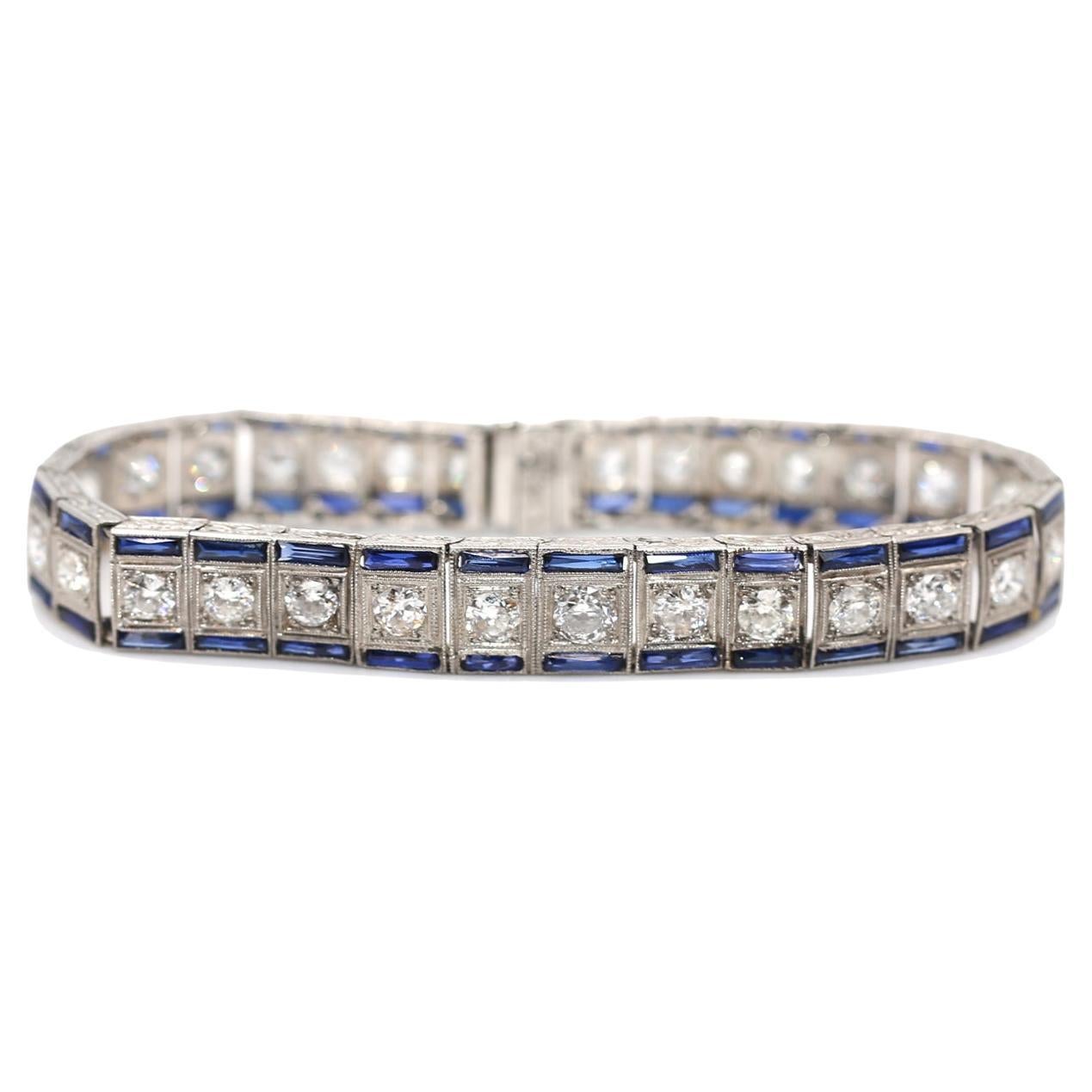Diamonds Sapphire Tennis Bracelet. Platinum.
Created in the USA during the roaring 1920-es, some 60 years before the term “tennis bracelet” was born. It is immaculately designed crafted and finished to perfectly sit on a hand. It is super flexible