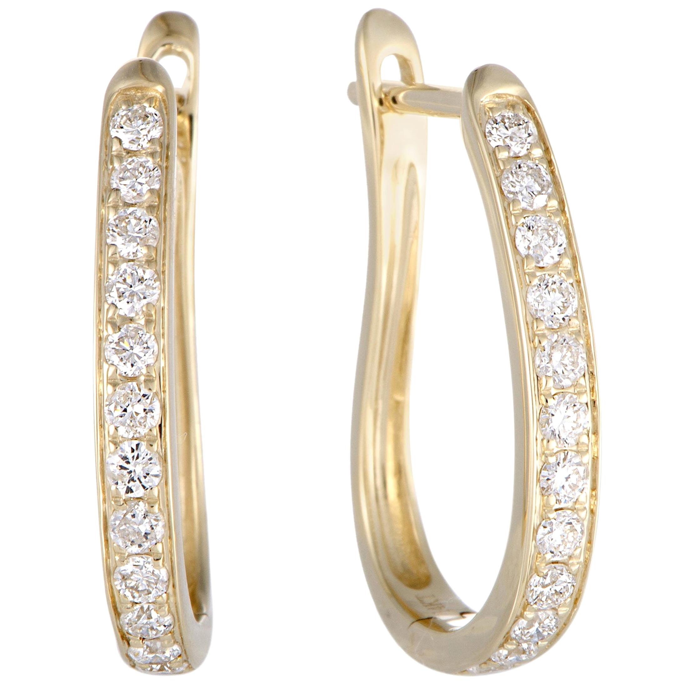 .25 Carat 14 Karat Yellow Gold Diamond Oval Hoop Earrings at 1stDibs