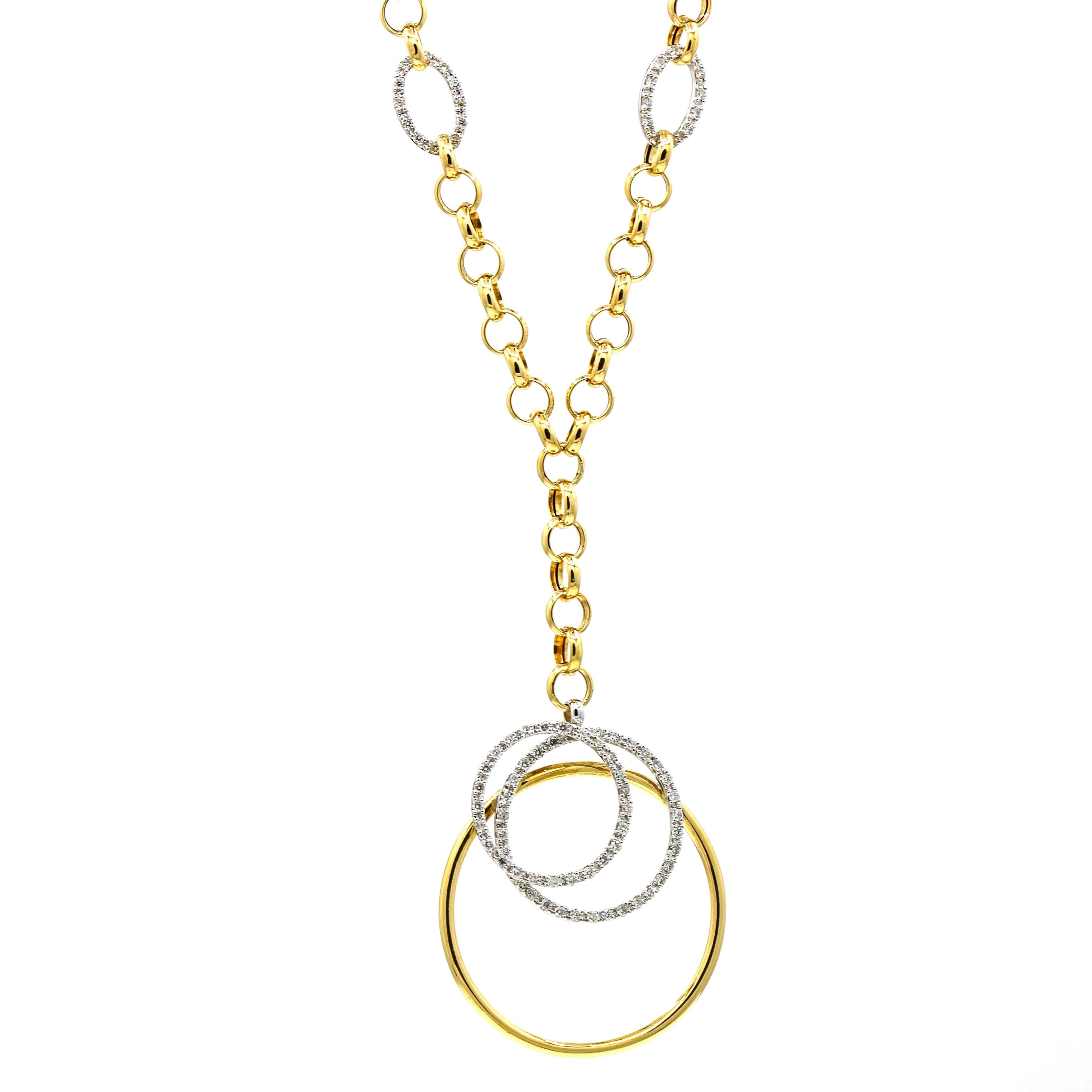 Diamond circles pendant necklace in 18-karat yellow and white gold. The chain has 4 diamond oval link stations and a drop pendant that has 3 circles, two of which are pave set with diamonds. Signed M.

Length, 18 inches
Width, 5mm
Depth, 4.5mm