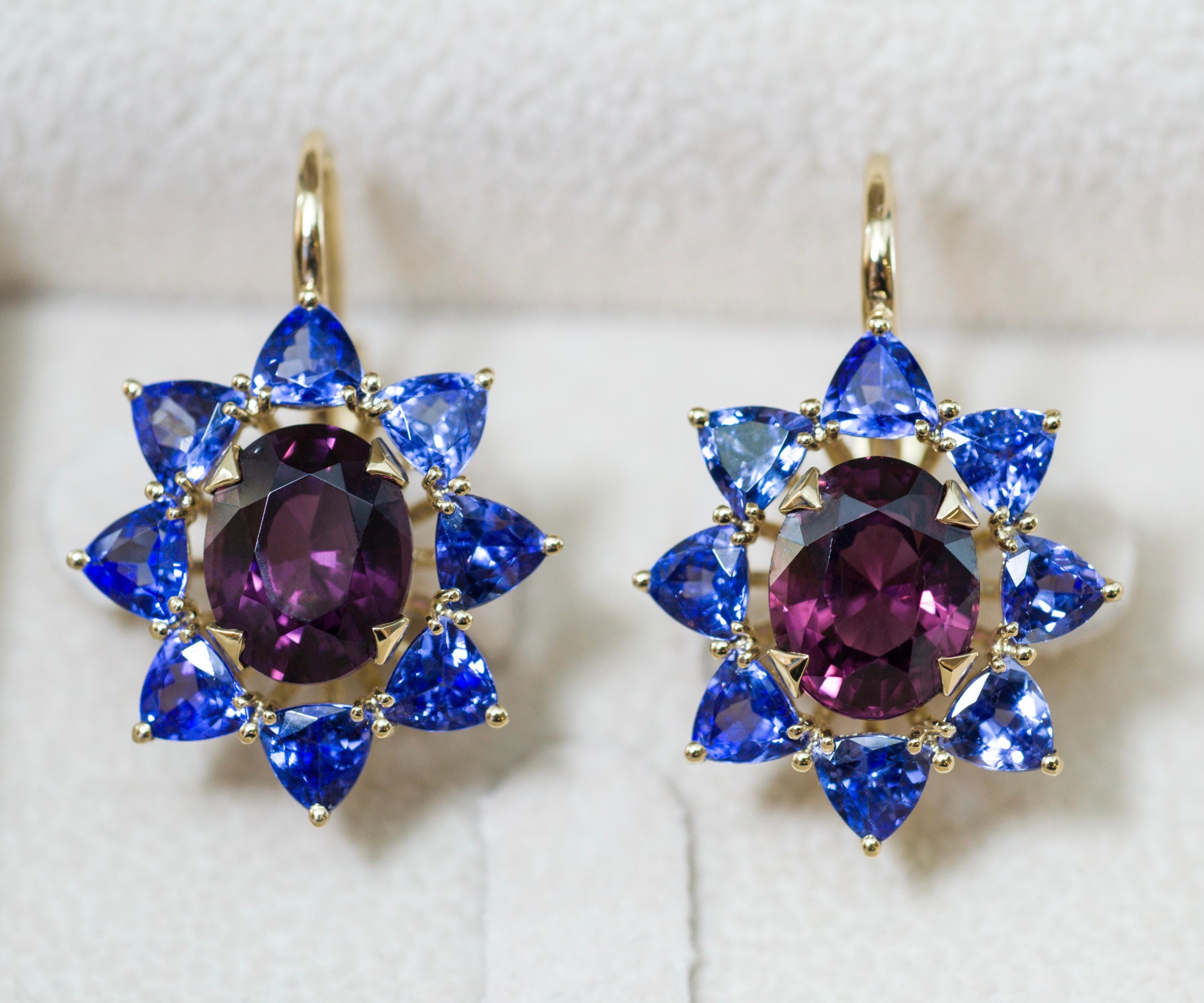 If you like unusial jewelry than this earrings are made specially for you.
Here we can see amazing and harmonious color combination: bordo Spinel in reach cherry color and beautiful violet eye clean Tanzanites in trillion shape.
18 Karat yellow gold