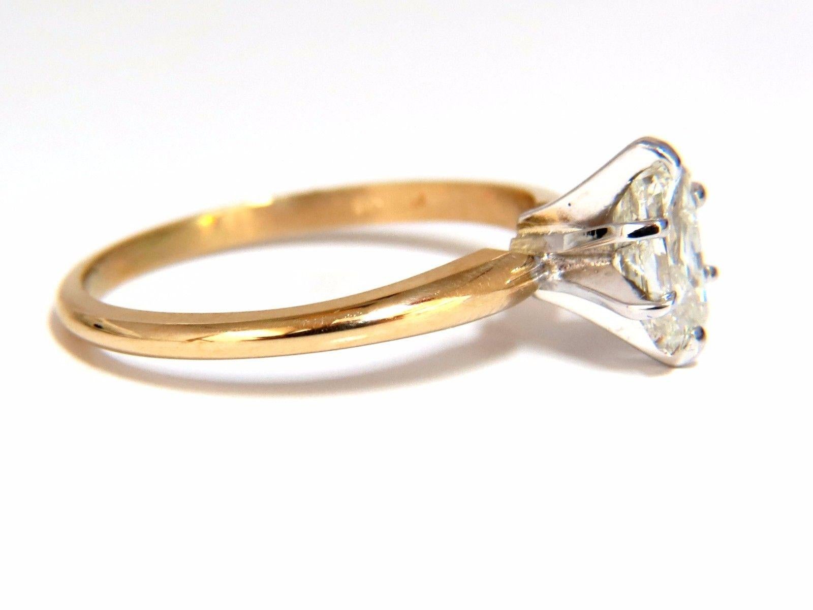 Solitaire Entry.

.75ct. Natural Long radiant cut brilliant diamond

solitaire ring.

Si-2 clarity / K color.

center diamond: 6.6 X 4.1mm

14kt yellow gold.

2.2 Grams

Current ring size: 7.25

May professionally resize, please inquire.