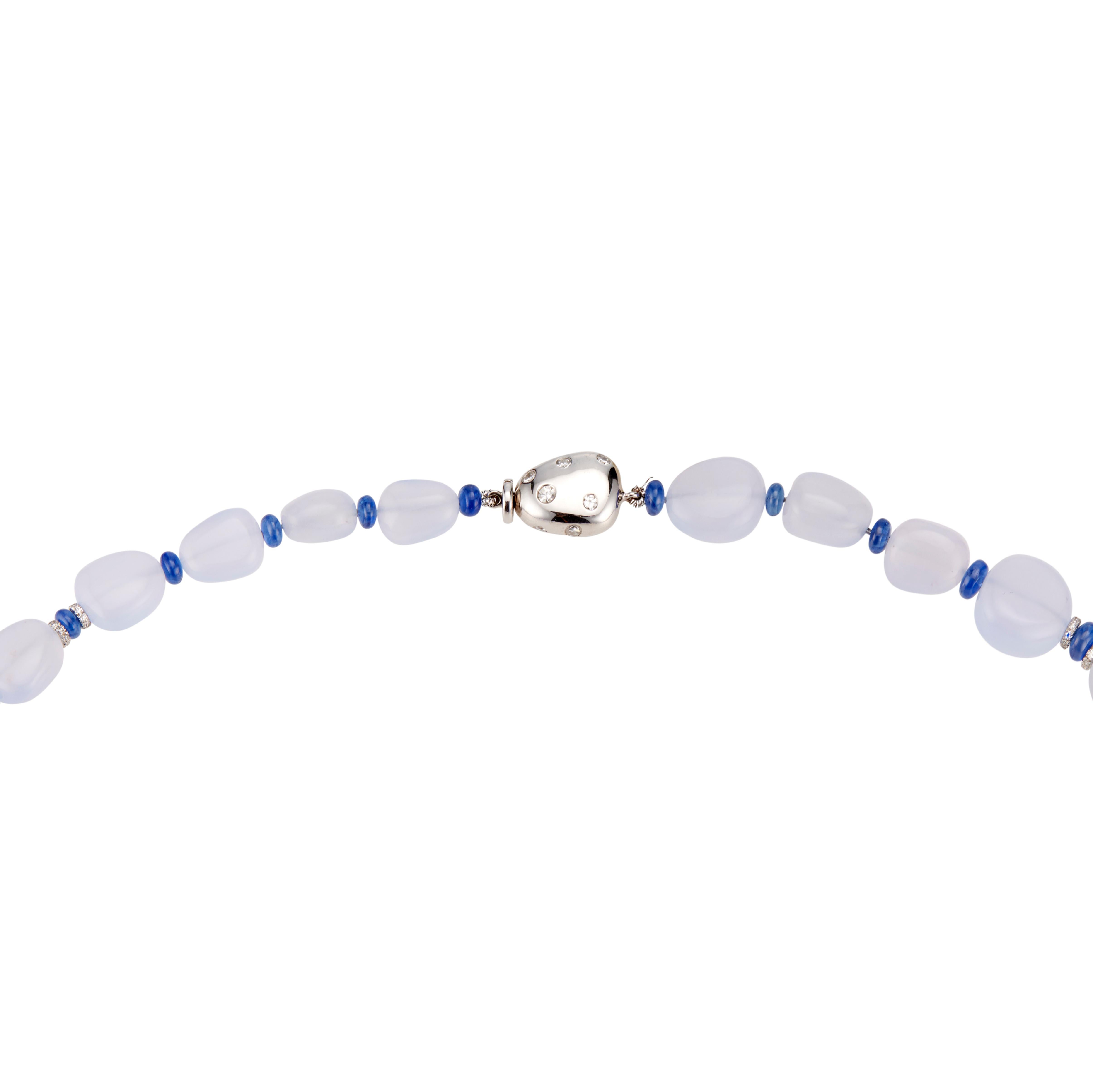 Translucent blue natural chalcedony beads with with genuine sapphire separators and 18k white gold rondells with round brilliant cut diamonds. 18k white gold diamond catch. 26 inches 

43 pale blue chalcedony beads
44 blue sapphire rondell beads