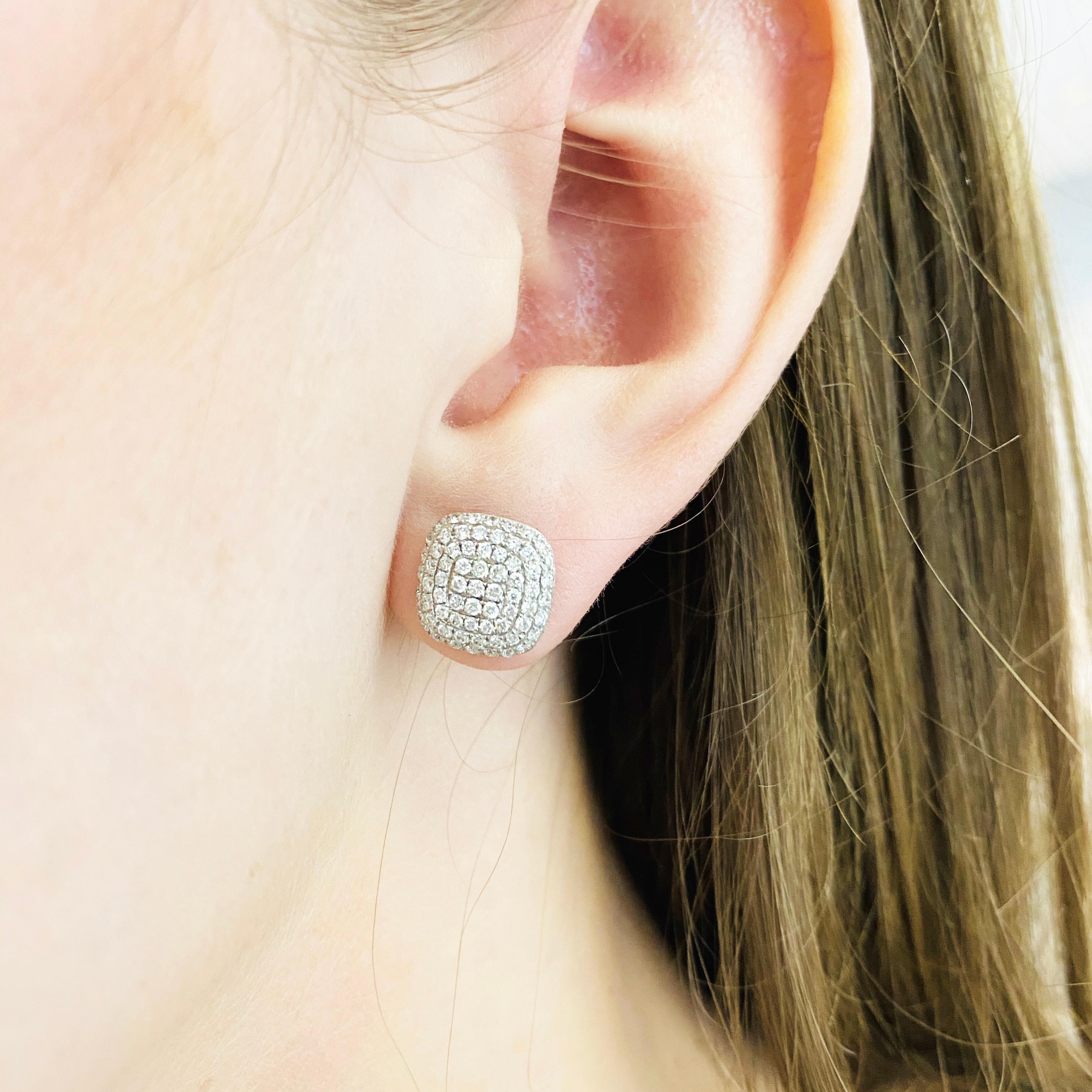 Stunning pave diamond earring studs! With over 100 round brilliant diamonds pave set! These earrings have 138 round brilliant diamonds set in 18 karat white gold. The 18 karat white gold is bright white and very strong, matching these bright white