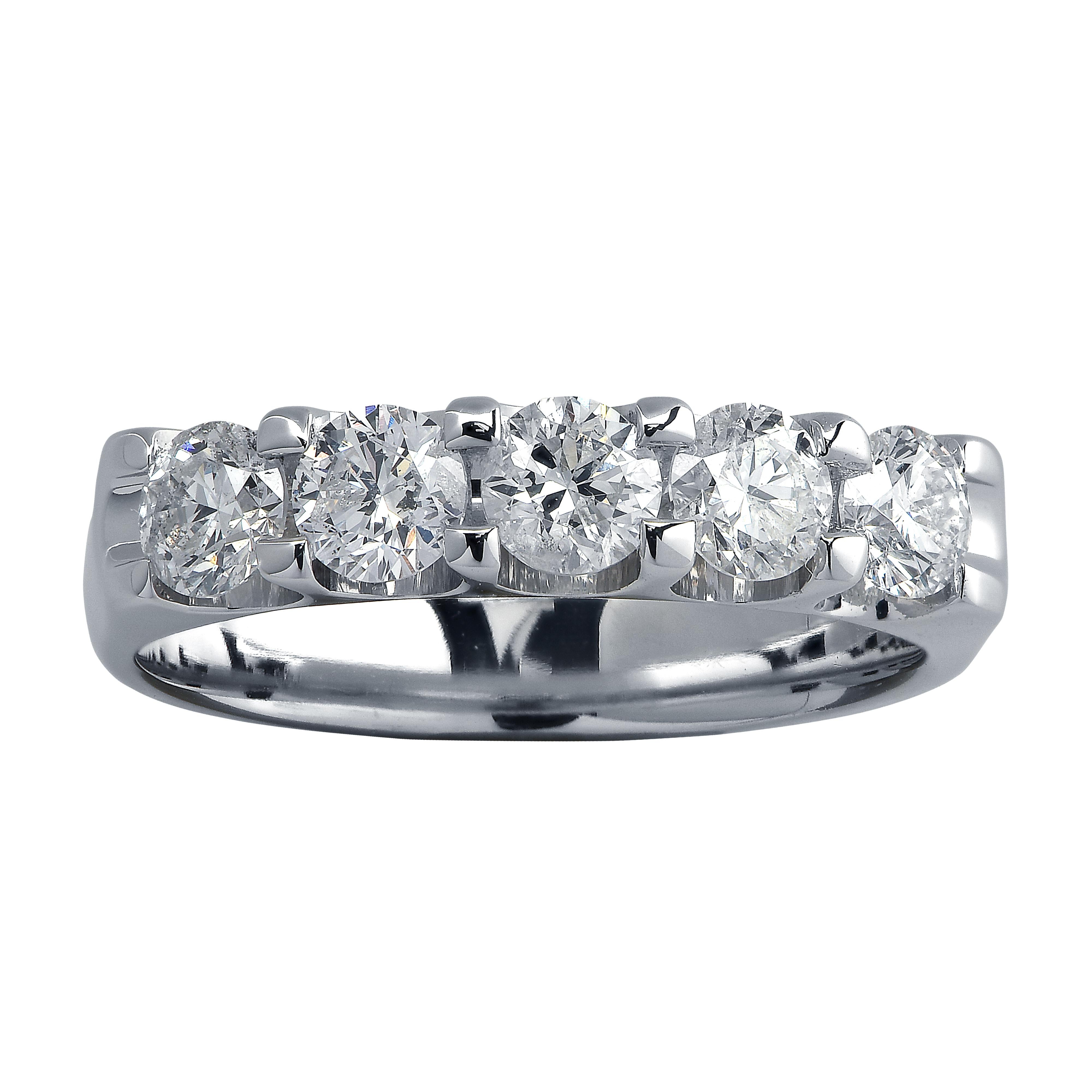 Stunning diamond band crafted in white gold featuring 5 round brilliant cut diamonds weighing approximately .75 carats total, G color SI2-3 clarity. This timelessly elegant ring is a size 4.25 and measures 3.8 mm in width.

Our pieces are all