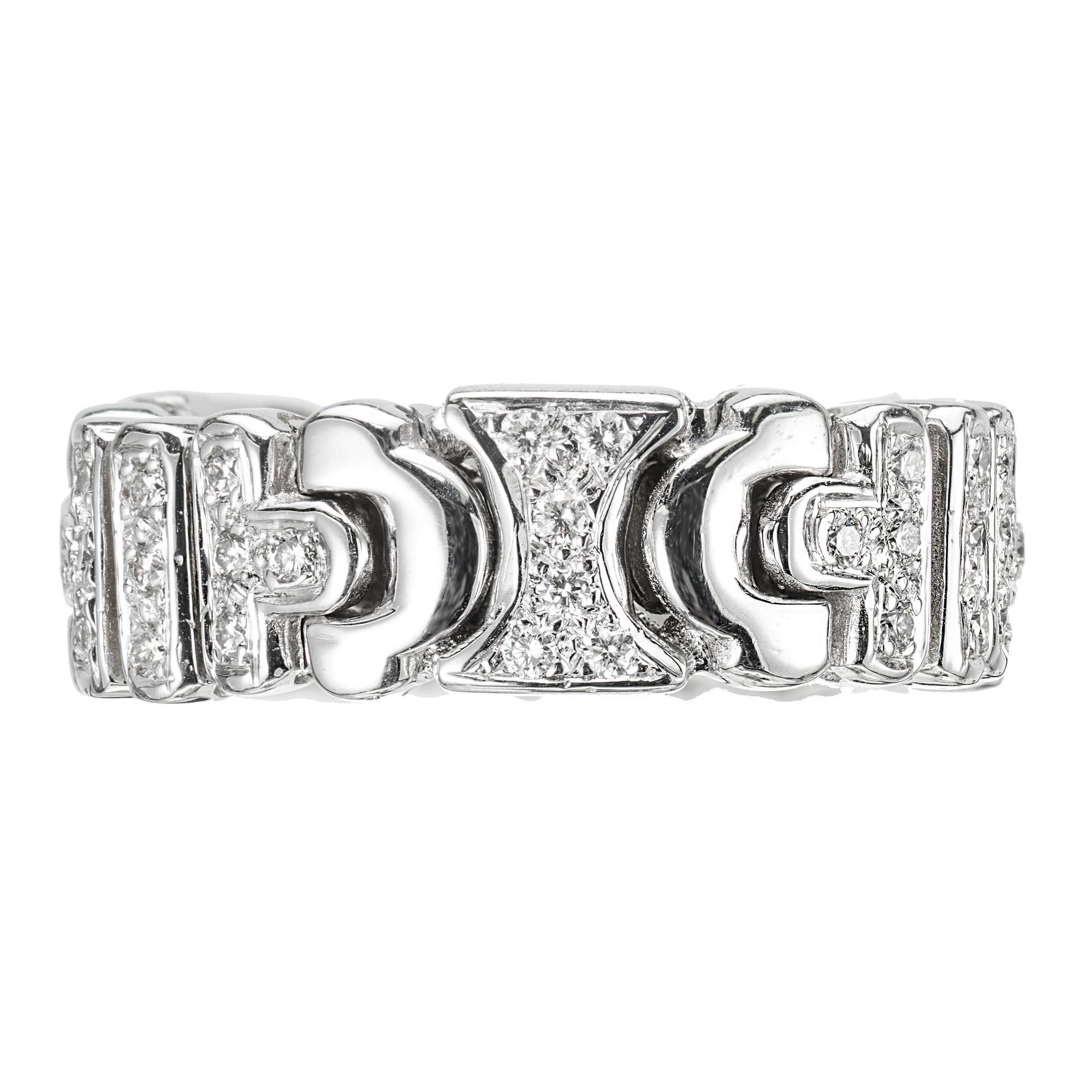 7mm wide flexible pave diamond eternity band. Set with 51 round cut diamonds in an 18k white gold band. Size 6.25 and not sizable. 

51 round diamonds, I-J VS approx. .75cts
Size 6.25 and not sizable
18k white gold 
Stamped: 18k
10.6 grams
Width at