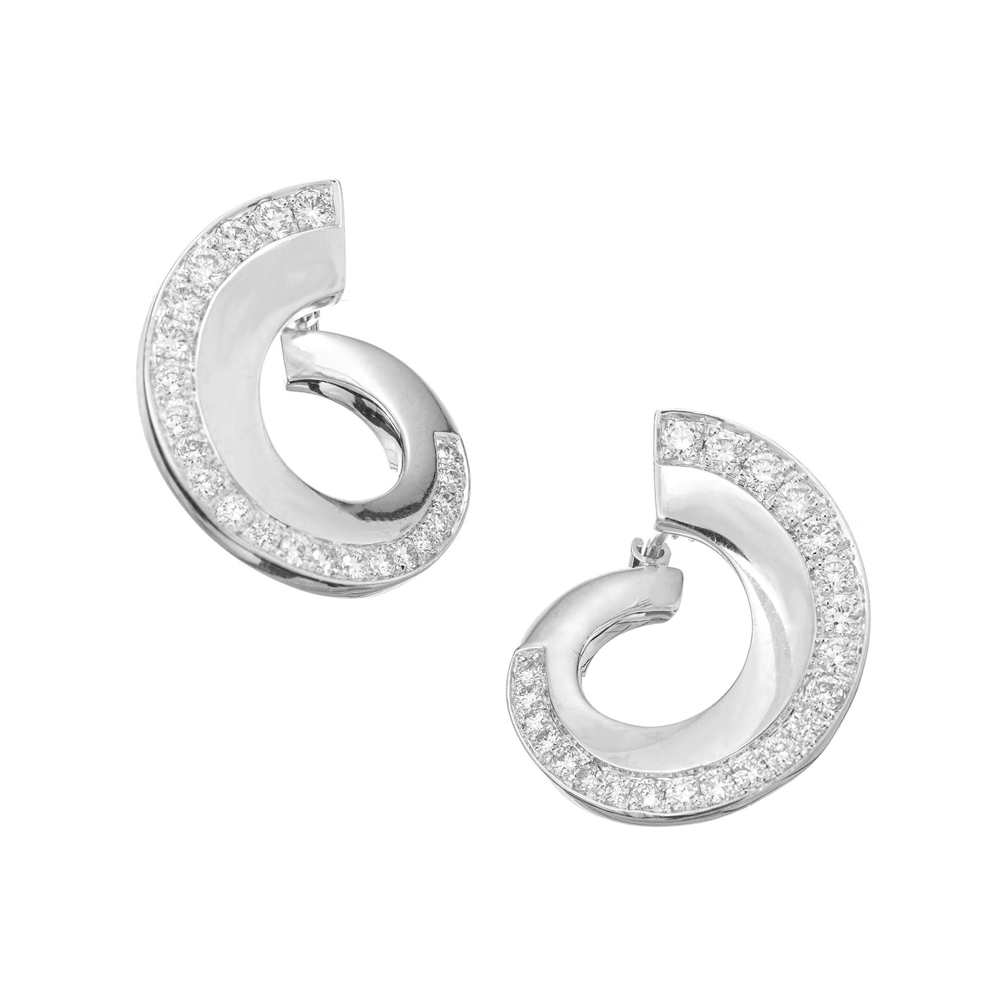 .75 Carat Diamond White Gold Swirl Earrings For Sale