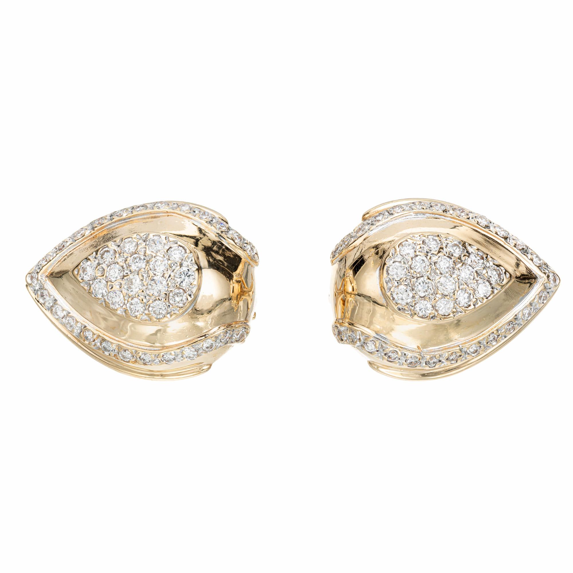 Clip post domed clip post diamond earrings. 82 round pave set diamonds set in pear shaped settings. .

82 round brilliant ct diamonds, G VS approx. .75cts
14k yellow gold 
Stamped: 14k
11.3 grams
Top to bottom: 21.3mm or .84 Inches
Width: 16.5mm or