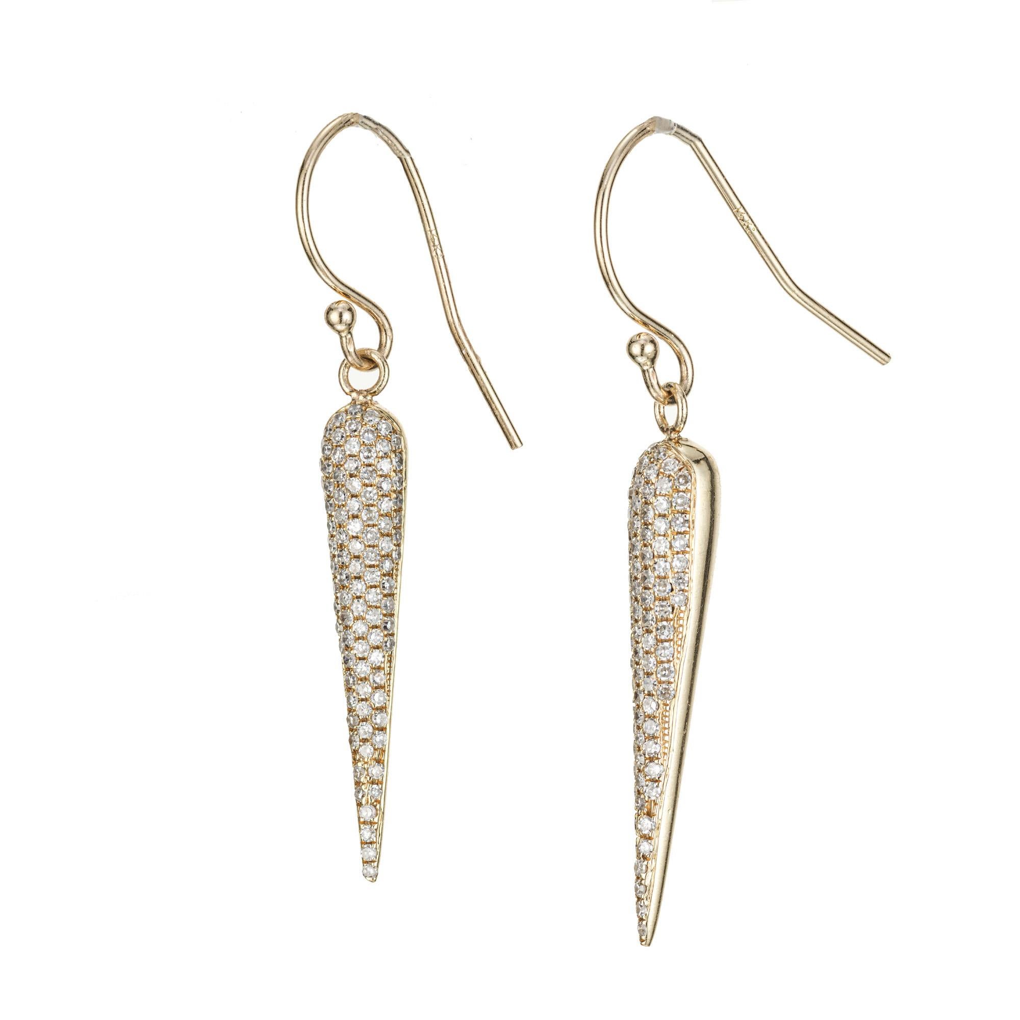 Simple and stylish pointed pave diamond earrings

196 round diamonds, H-I I approx. .75cts
14k yellow gold 
Stamped: 14k
2.5 grams
Top to bottom: 35.6mm or 1.4 Inches
Width: 4.2mm or .16 Inches
Depth or thickness: 4.2mm
