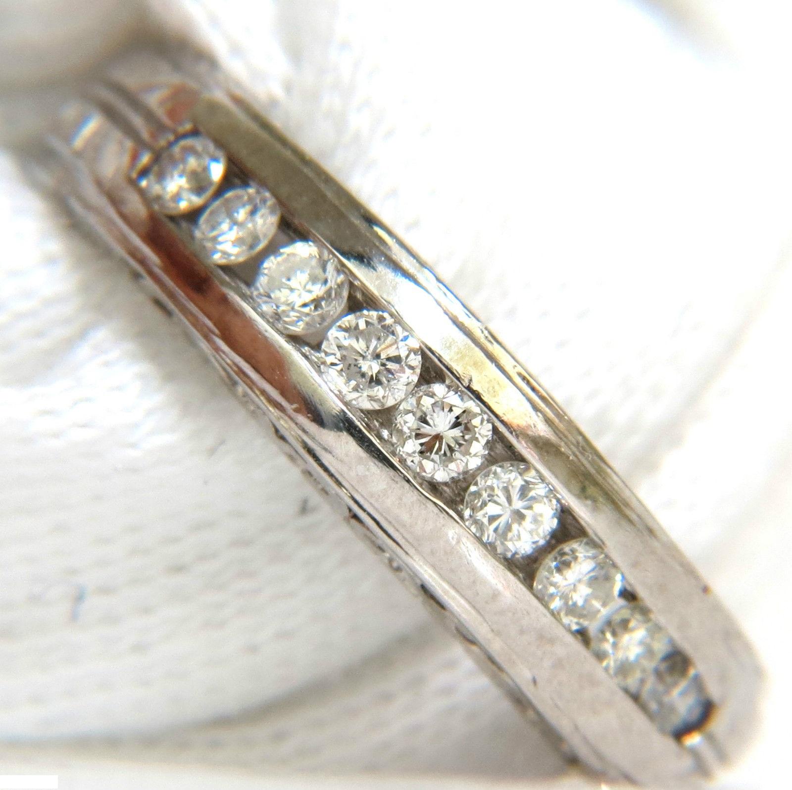 Vintage Platinum Deco

.75ct diamonds

G-color Vs-2 clarity

Full Cuts and rounds

Gorgeous etching detail on sites and shanks

9.8 grams

Ring is 5.6mm wide

$4500 Appraisal will accompany